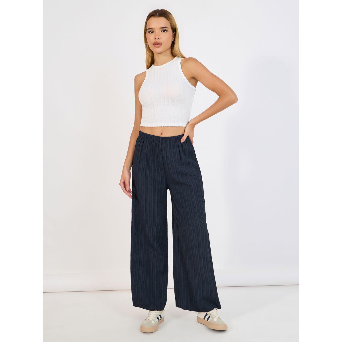 بنطال بالازو بتفاصيل بارزة الملمس وخصر مطاطي-women-clothing-bottoms-trousers-image-1