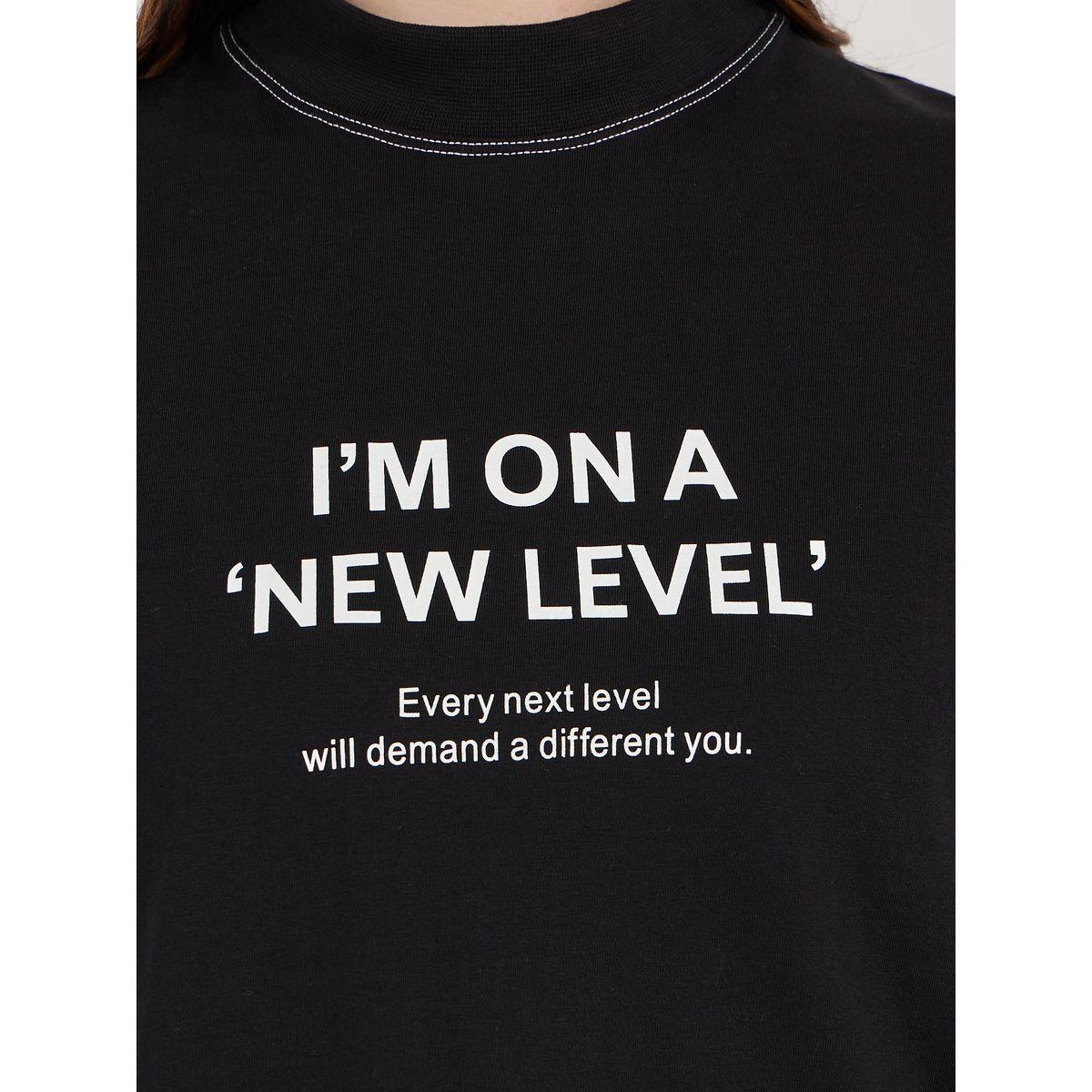 تيشيرت فضفاض بطبعة كتابة وأكمام مُبالغ فيها-women-clothing-tshirts-image-4