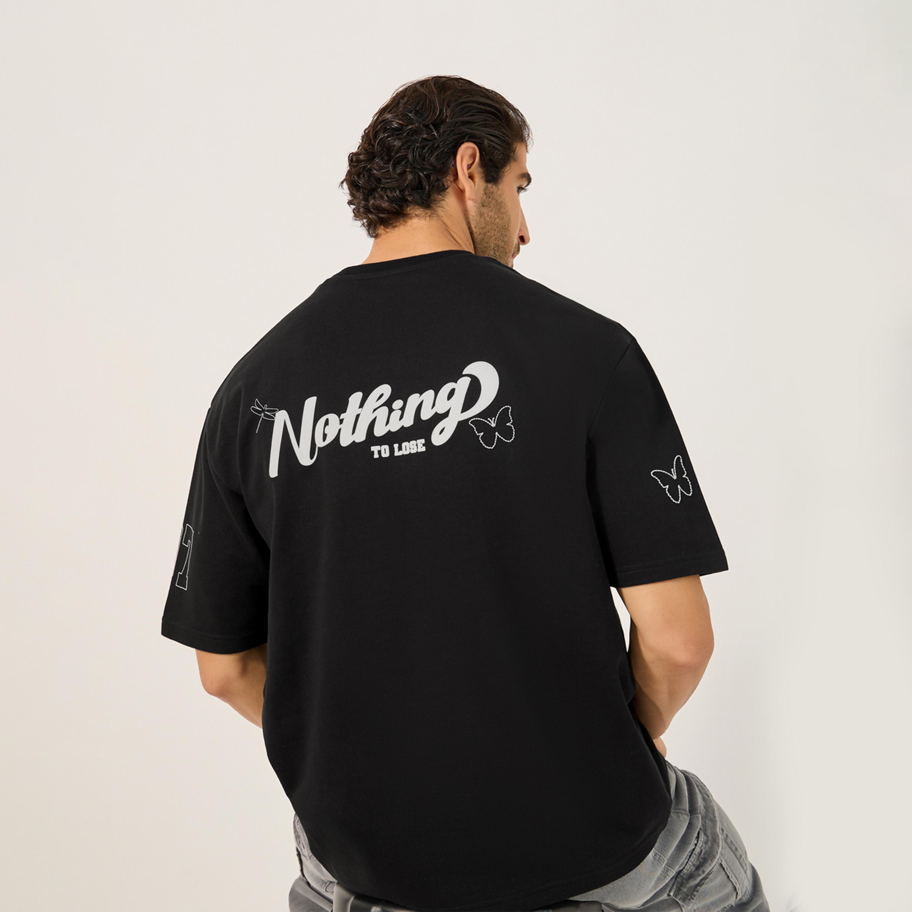 ستايلي - تي شيرت كبير الحجم بطبعة شعار-men-clothing-tshirtsandpolos-tshirts-image-1