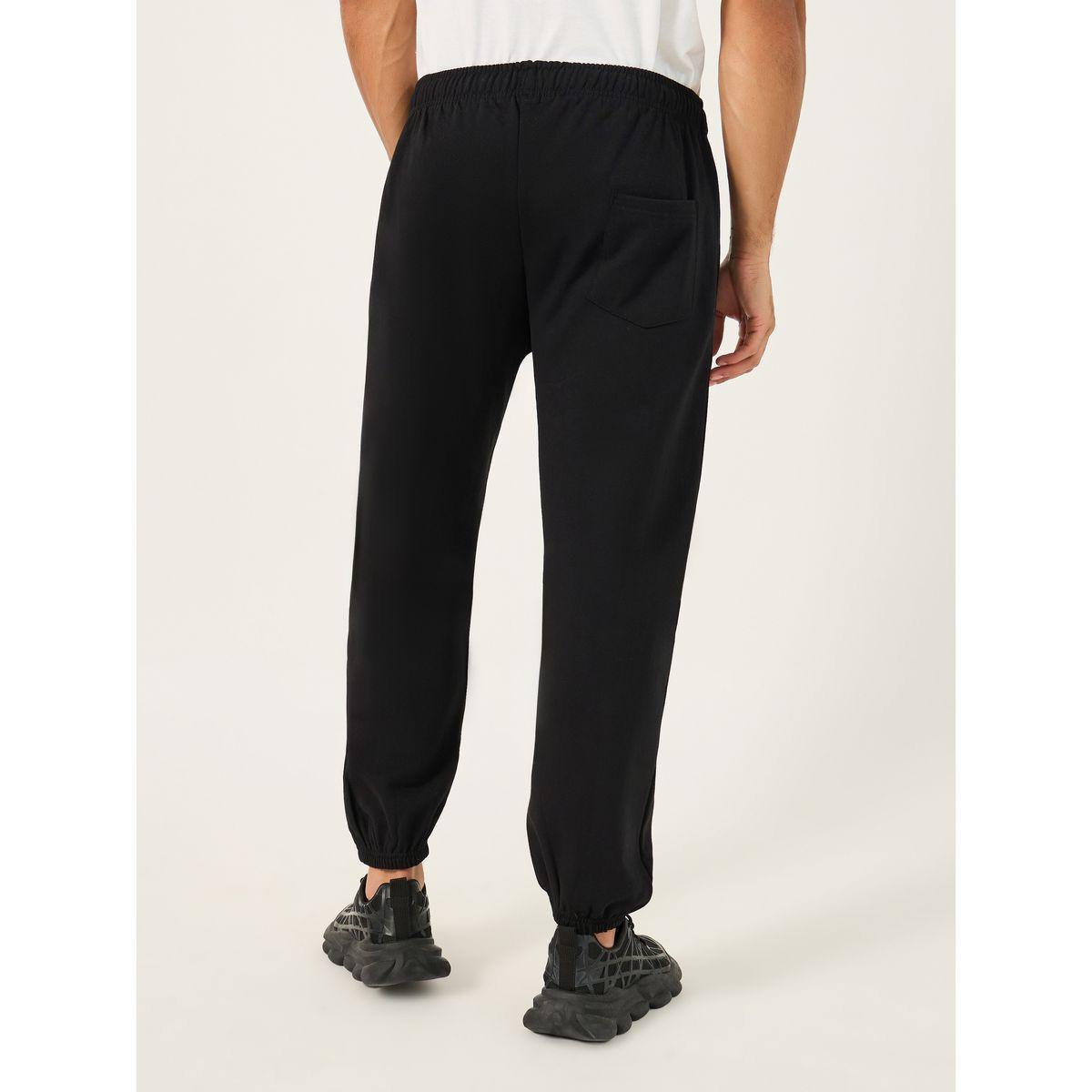 جوغر قطن بقصة مريحة وطبعة جرافيك-men-clothing-bottoms-joggers-image-4