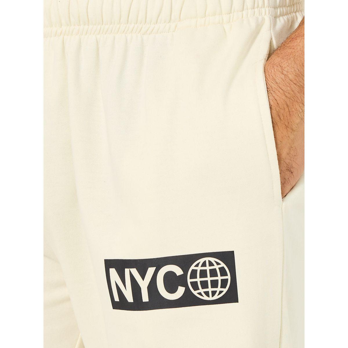 جوغر قطن بقصة مريحة وطبعة جرافيك-men-clothing-bottoms-joggers-image-3