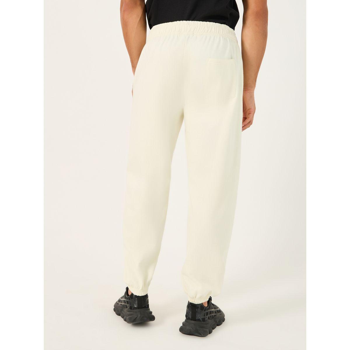 جوغر قطن بقصة مريحة وطبعة جرافيك-men-clothing-bottoms-joggers-image-4