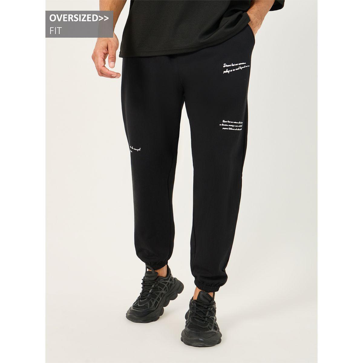 Styli Slogan Print Cotton Rich Fleece Oversized Joggers-men-clothing-bottoms-joggers-image-1