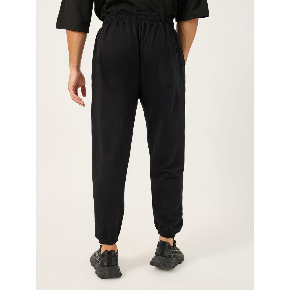 جوغر قطن بنسيج فليس فضفاض بطبعة كتابة-men-clothing-bottoms-joggers-image-4