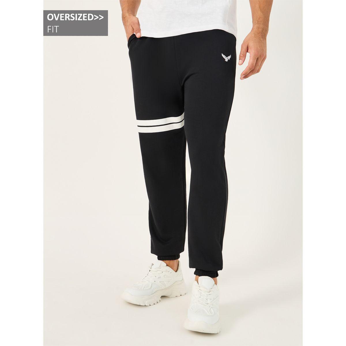 جوغر فضفاض ومخطط بتفاصيل مُطرزة-men-clothing-bottoms-joggers-image-1