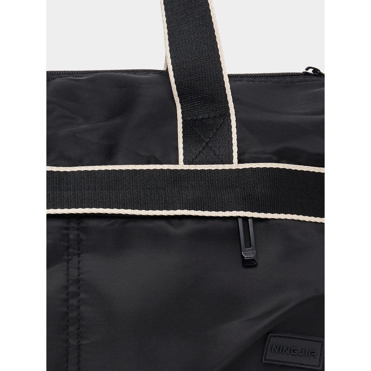 شنطة رياضية بمقبضين يد وتفاصيل مُتباينة-travel-luggagesandbags-dufflebags-image-3