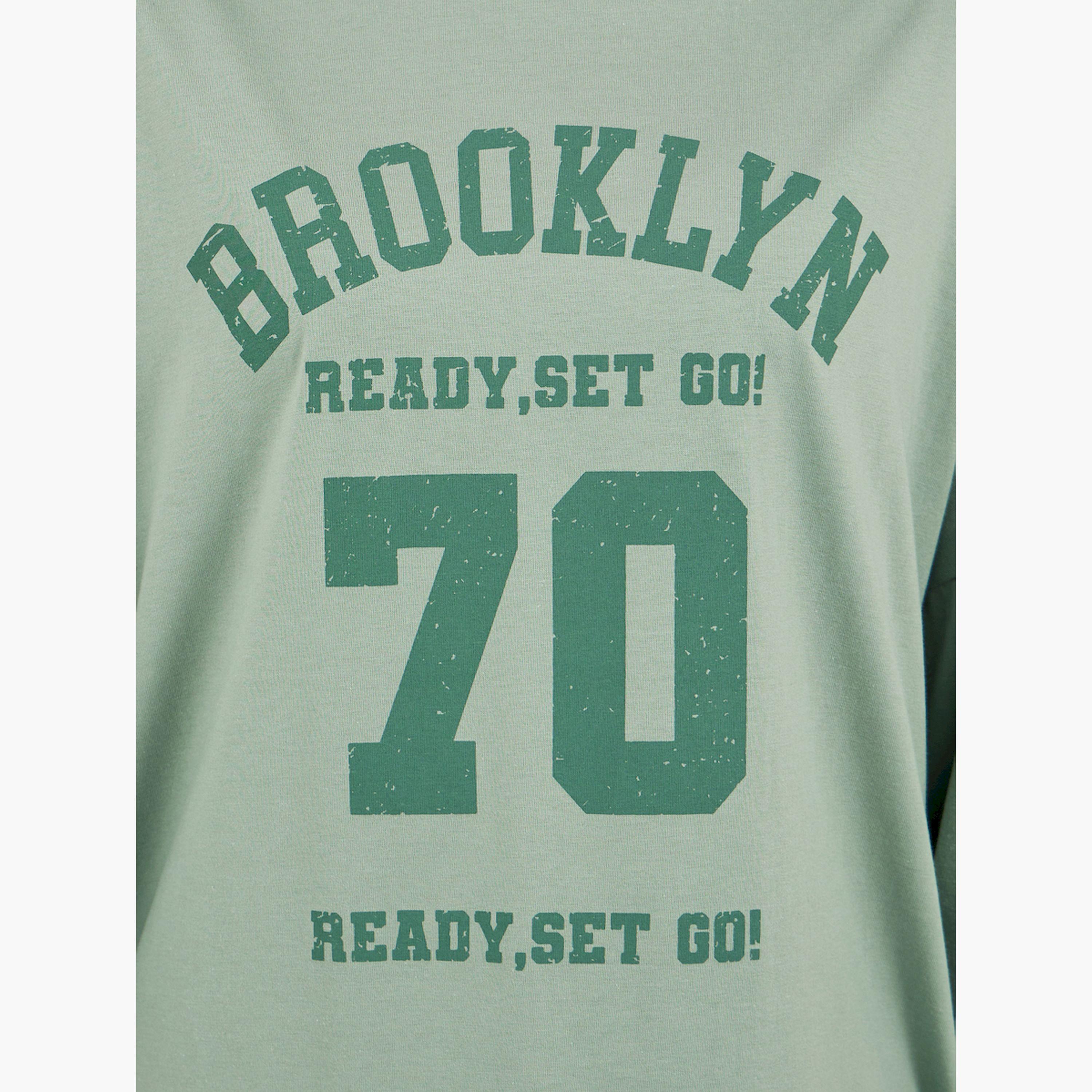 Styli Brooklyn Varsity Print Exaggerated Sleeves Oversized T-Shirtâ€‹-women-clothing-tshirts-image-3