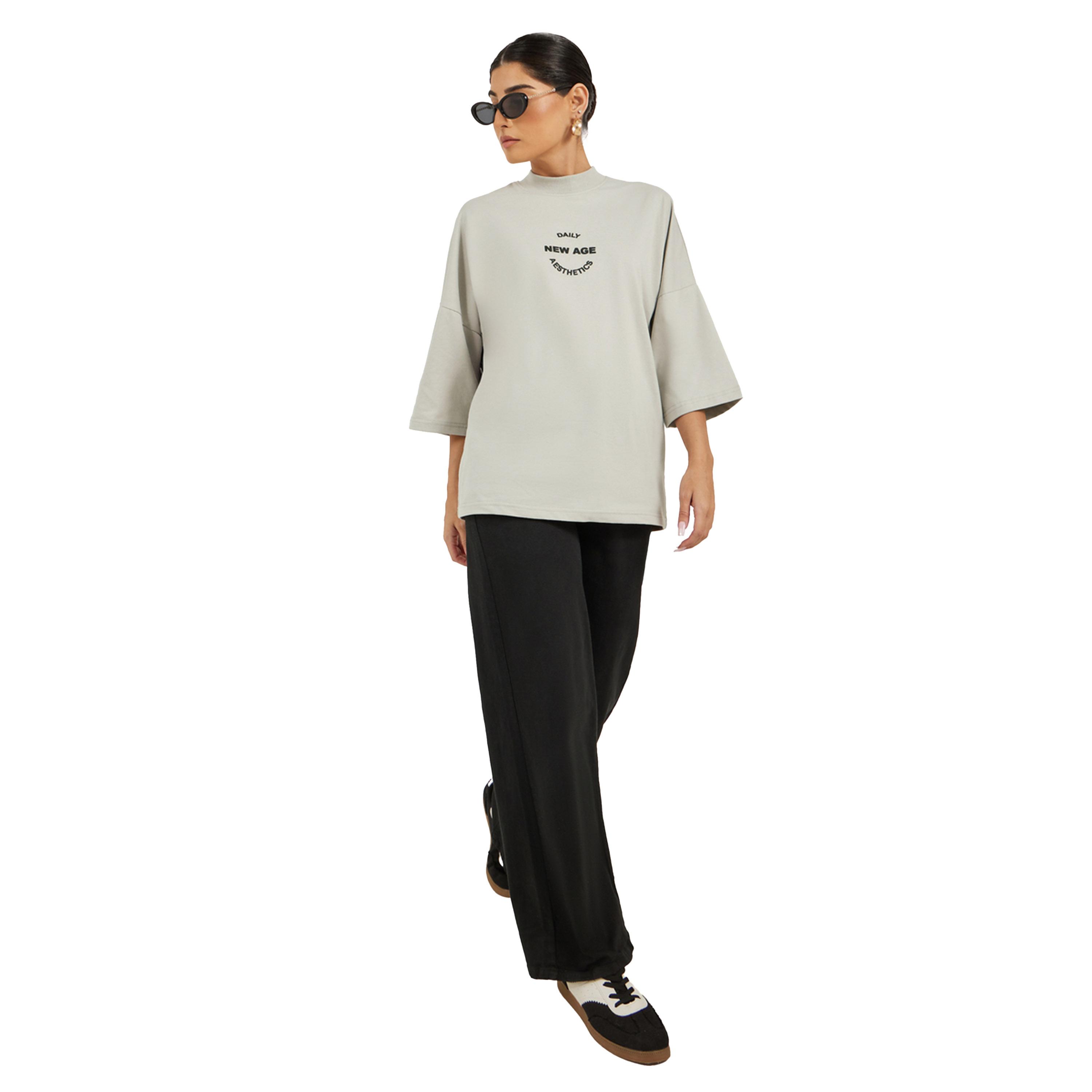 ستايلي -  تي شيرت مقاس كبيربرقبة عالية ومطبوع عليه شعار-women-clothing-tshirts-image-2