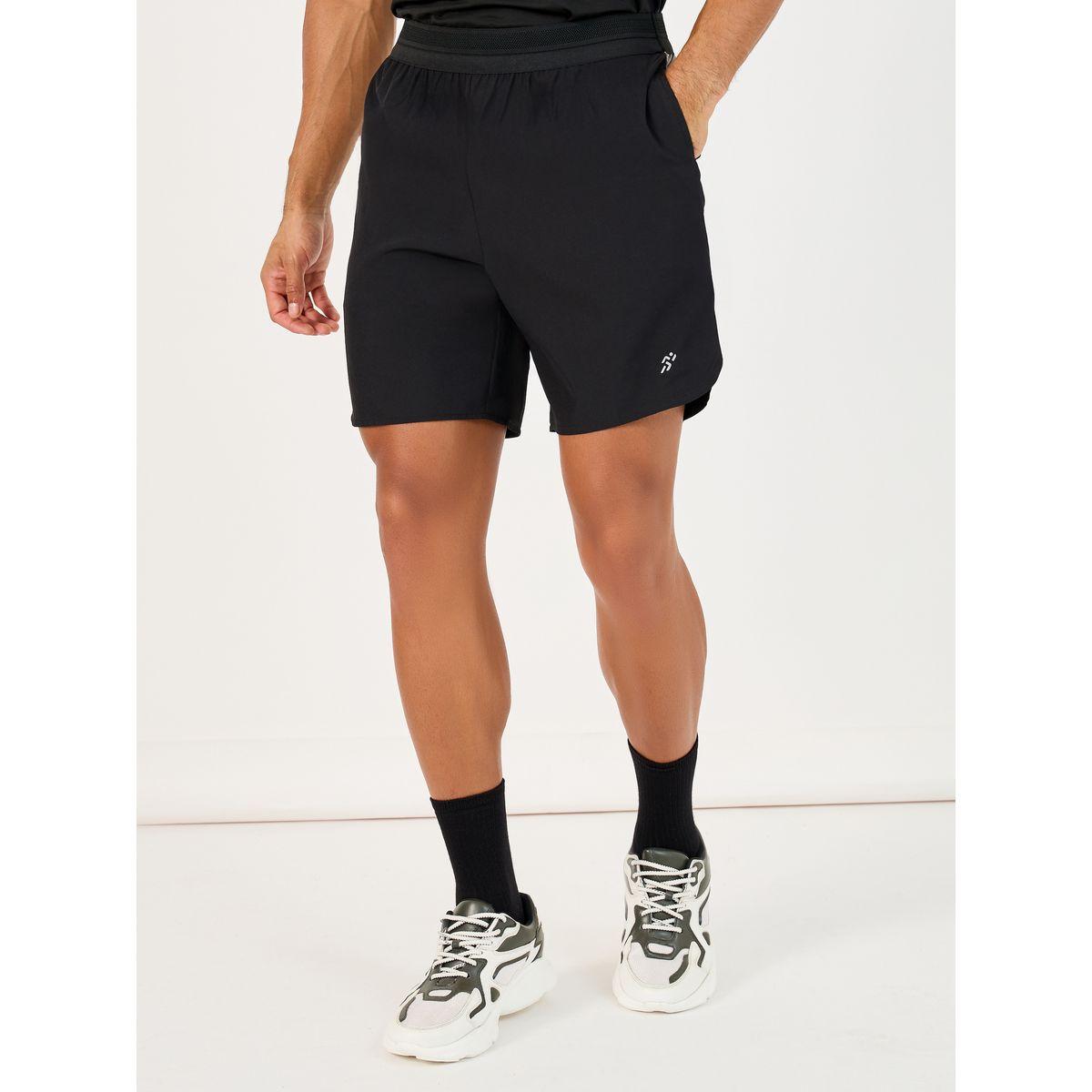 شورت رياضي منسوج بخصر مطاطي-men-clothing-sportswearandactivewear-bottoms-image-1