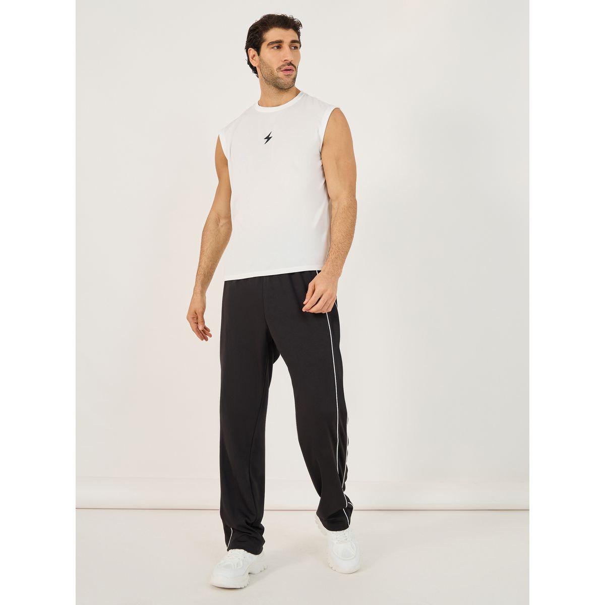 بنطال رياضي فضفاض بتفاصيل محزوزة وأربطة-men-clothing-sportswearandactivewear-bottoms-image-2