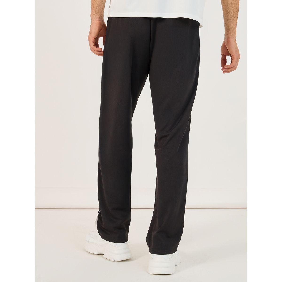 بنطال رياضي فضفاض بتفاصيل محزوزة وأربطة-men-clothing-sportswearandactivewear-bottoms-image-4