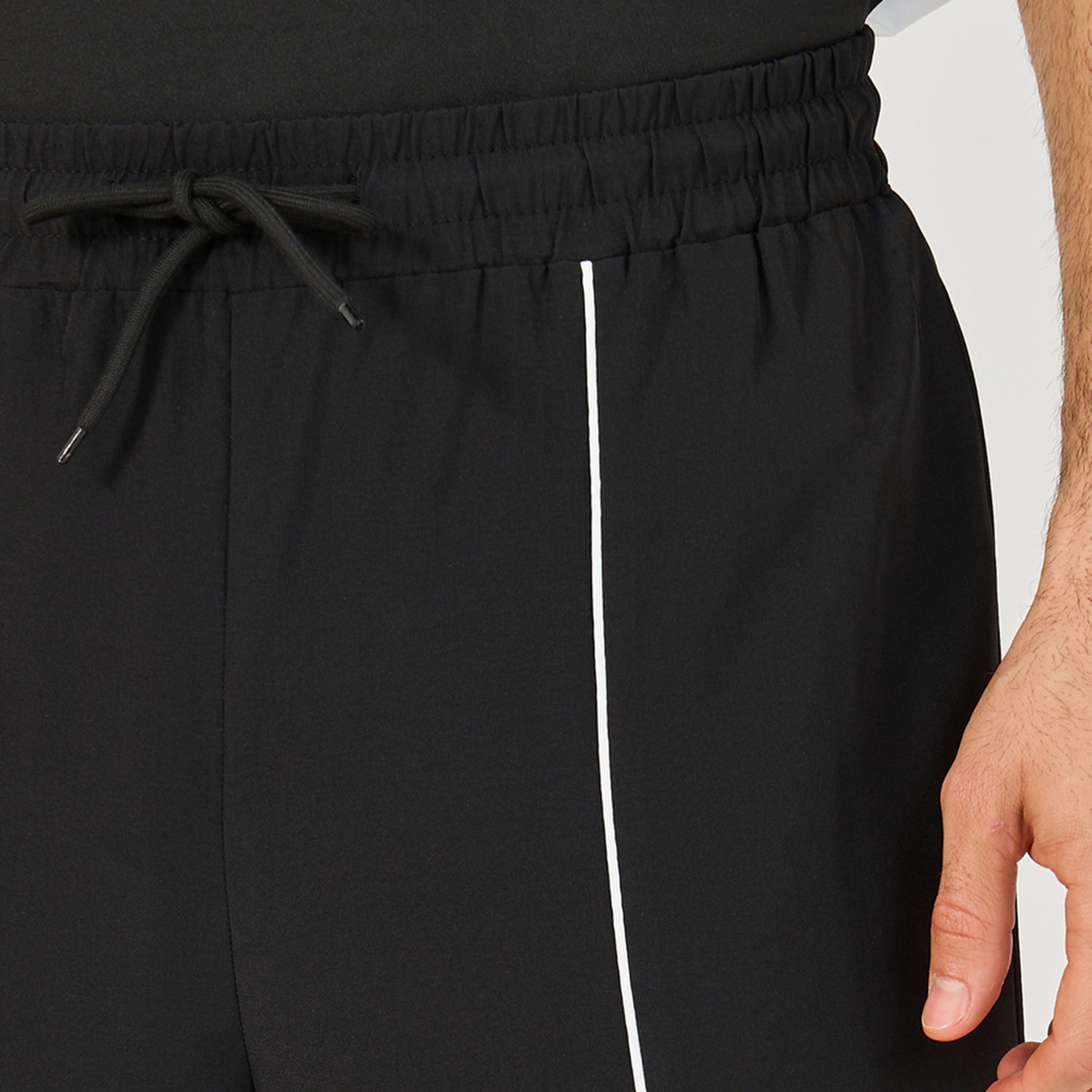 ستايلي - بنطال رياضي ضيق من قماش مضغوط بأربعة اتجاهات مع حواف مزينة-men-clothing-sportswearandactivewear-bottoms-joggers-image-3