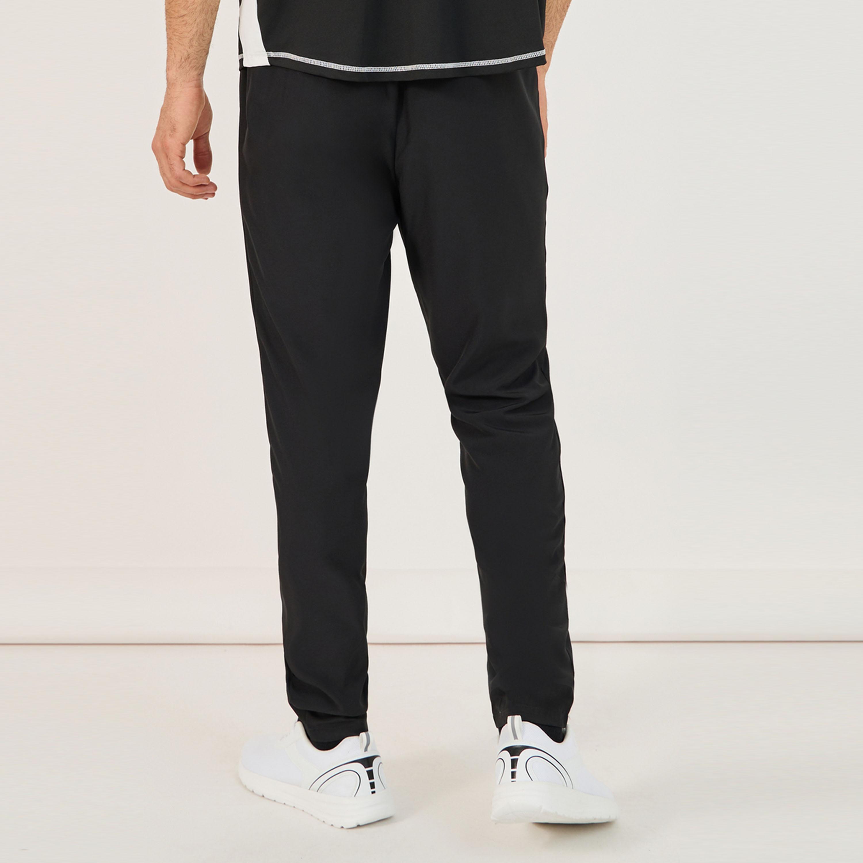 Styli Active 4-Way Stretch Compression Knit Slim Track Pants with Piping Detail-men-clothing-sportswearandactivewear-bottoms-joggers-image-4