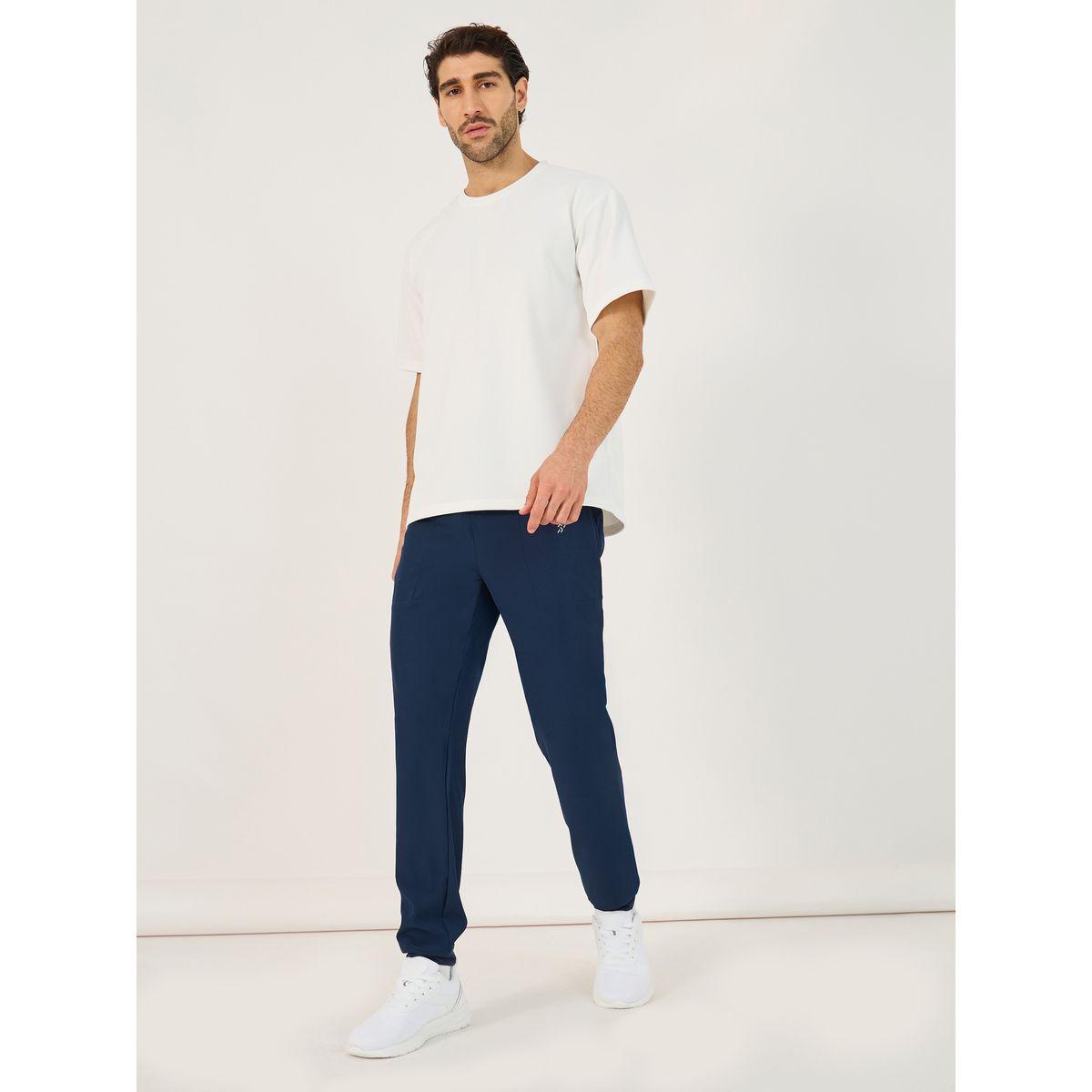 بنطال رياضي بقصة سليم فت وتفاصيل خياطة-men-clothing-sportswearandactivewear-bottoms-image-2