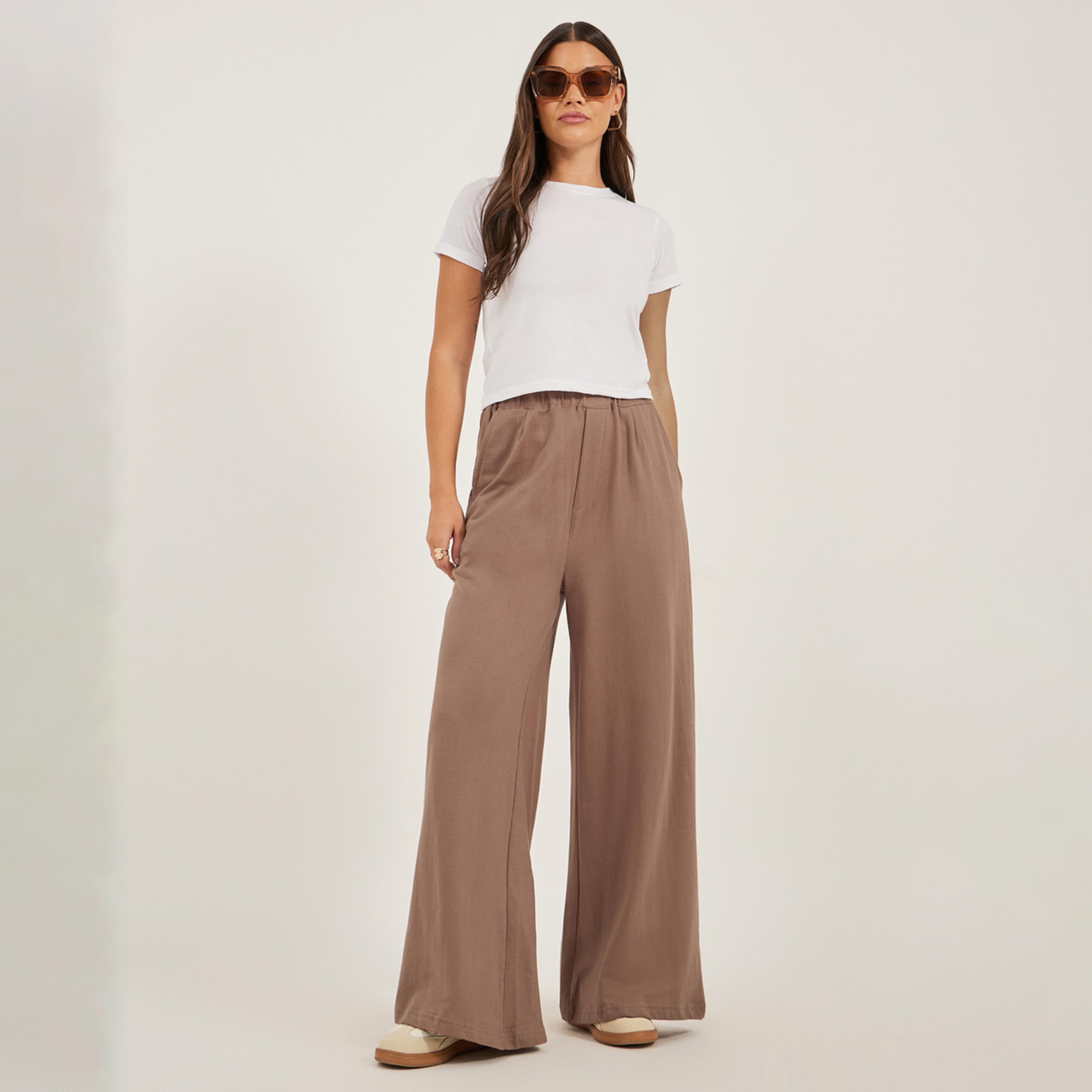 ستايلي - بنطال رياضي واسع الساق بحزام خصر مطاطي وجيوب-women-clothing-bottoms-joggers-image-1