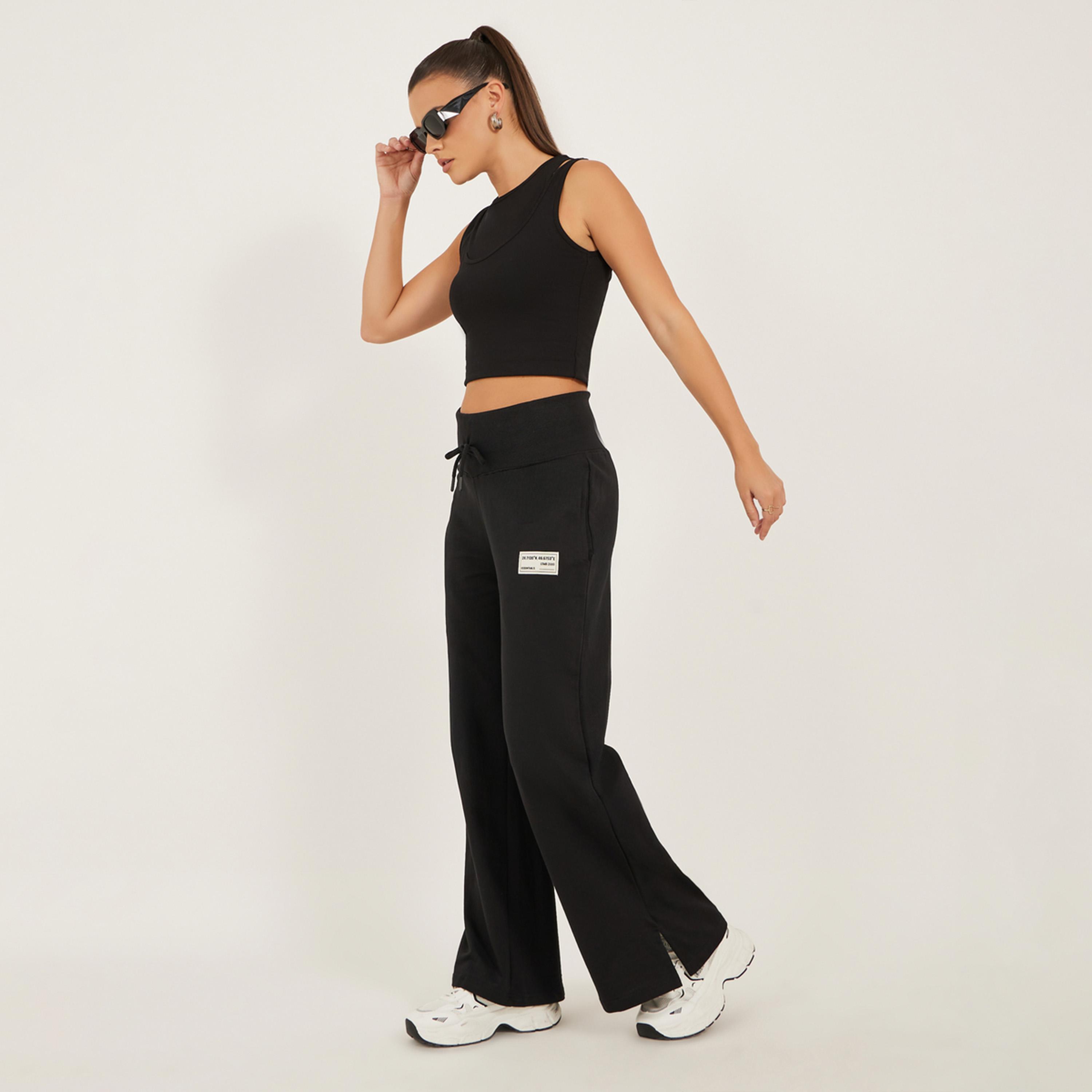 ستايلي - بنطال رياضي واسع الساق بتفاصيل شارة مع شق جانبي-women-clothing-bottoms-joggers-image-1