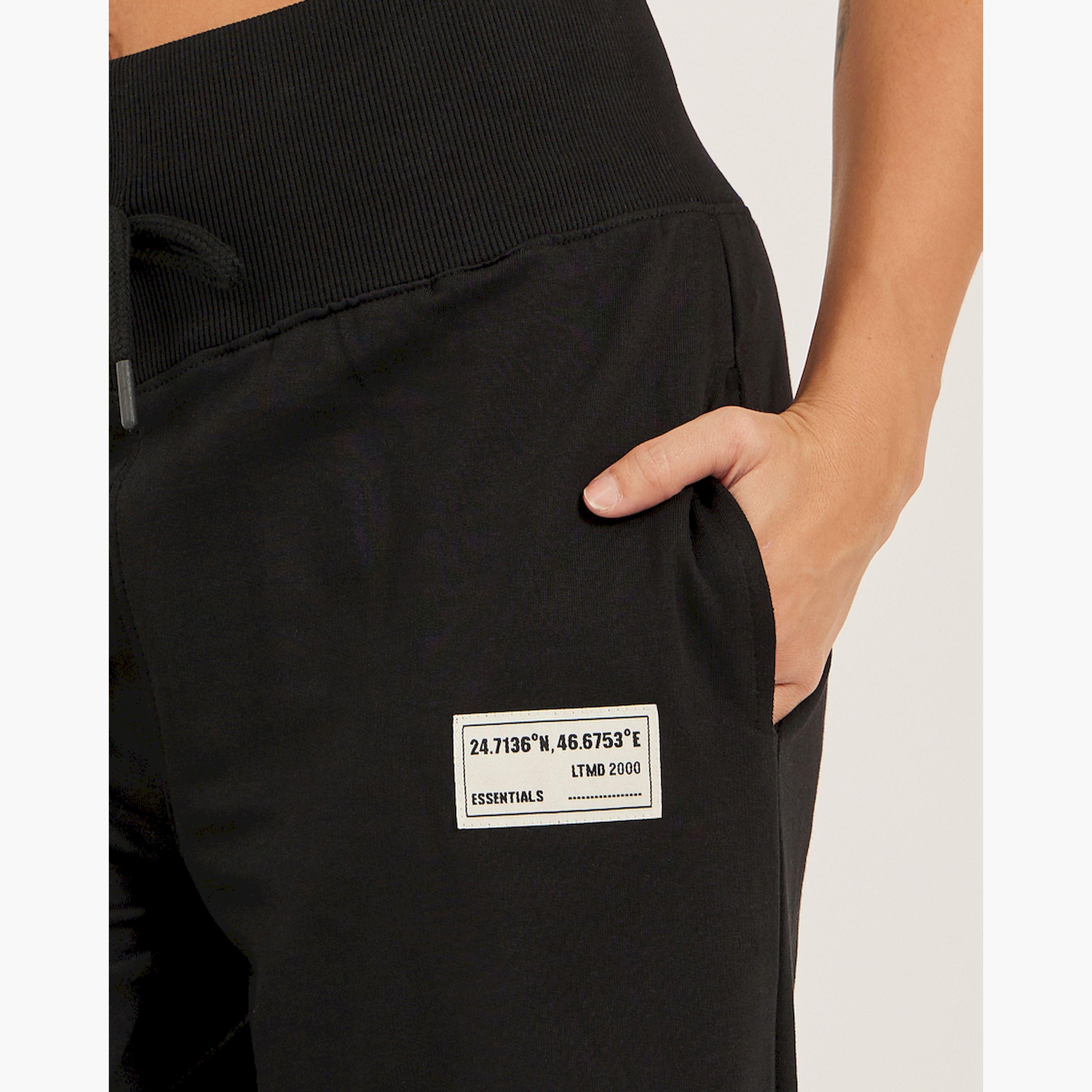 ستايلي - بنطال رياضي واسع الساق بتفاصيل شارة مع شق جانبي-women-clothing-bottoms-joggers-image-4