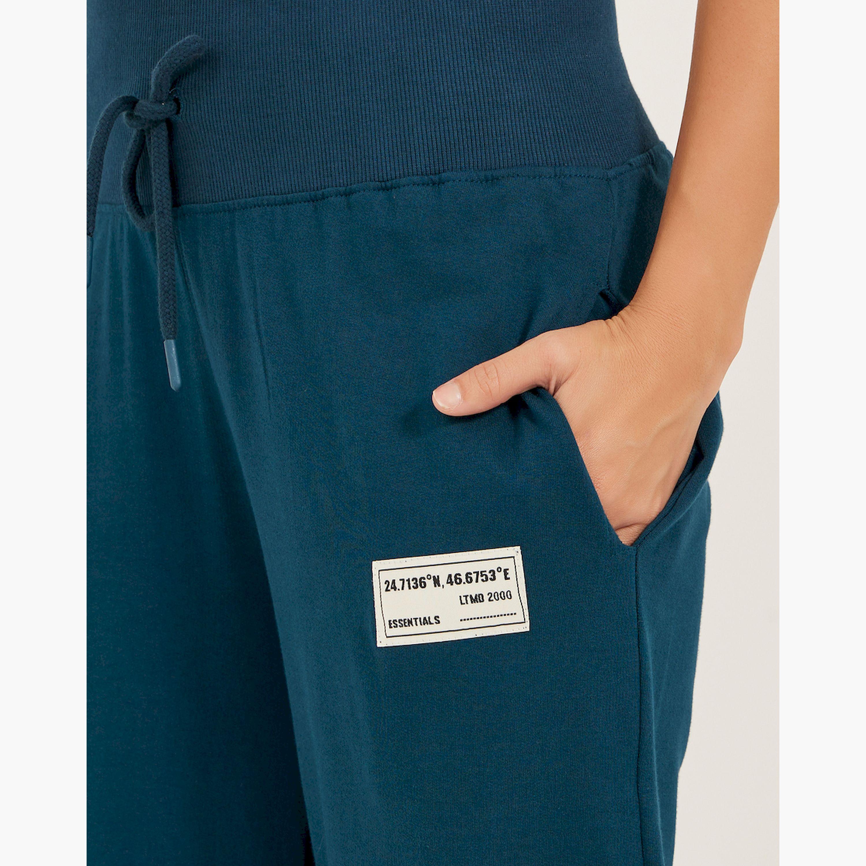 Styli Badge Detail Wide Leg Joggers with Side Slit-women-clothing-bottoms-joggers-image-3