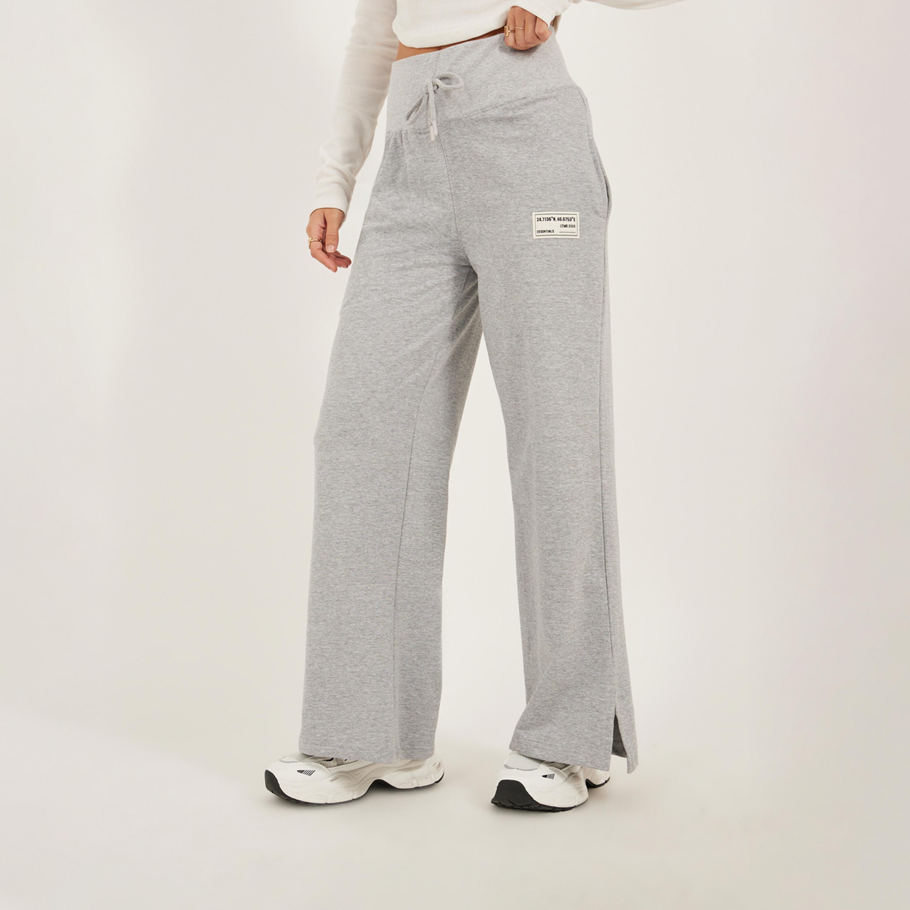 ستايلي - بنطال رياضي واسع الساق بتفاصيل شارة مع شق جانبي-women-clothing-bottoms-joggers-image-2