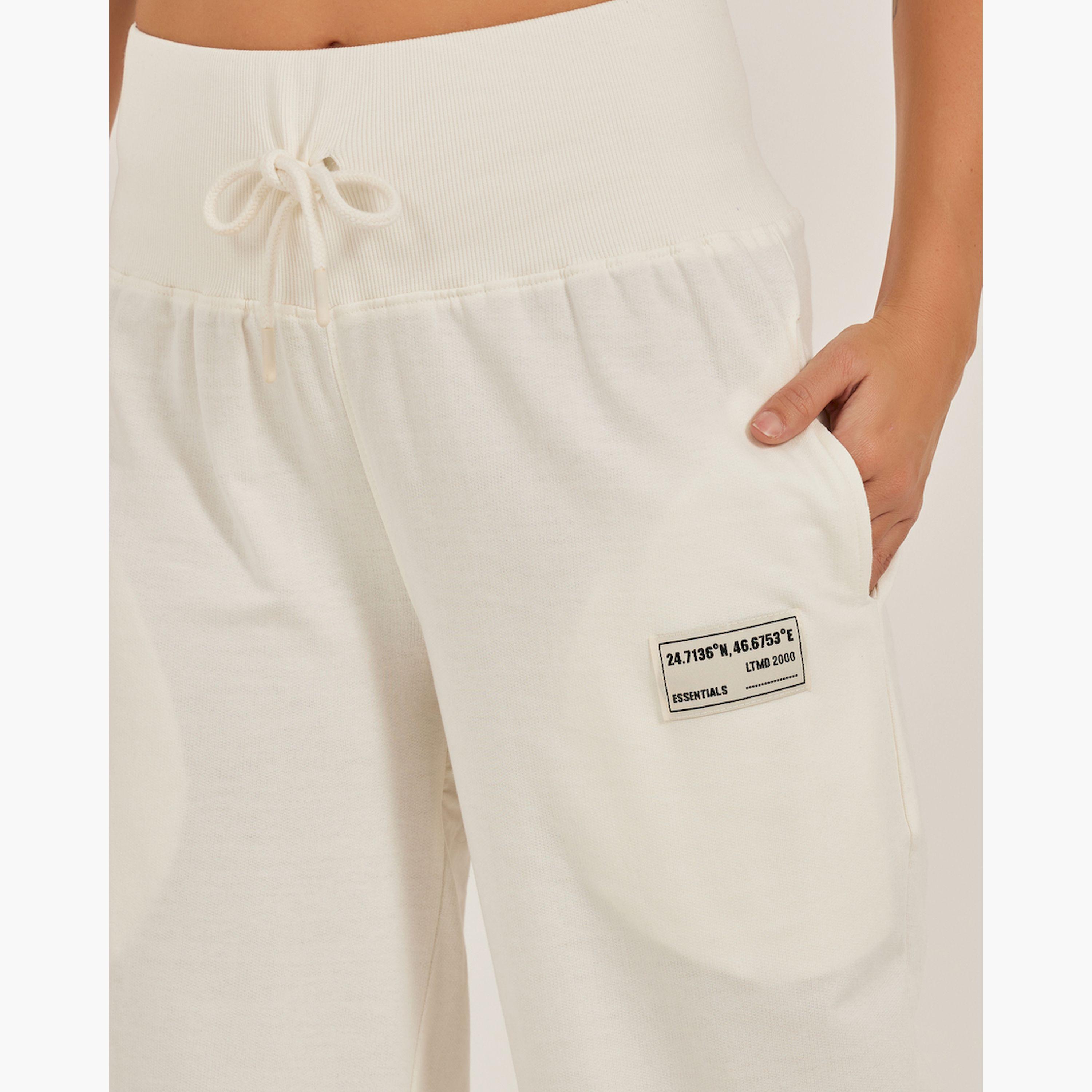 ستايلي - بنطال رياضي واسع الساق بتفاصيل شارة مع شق جانبي-women-clothing-bottoms-joggers-image-4