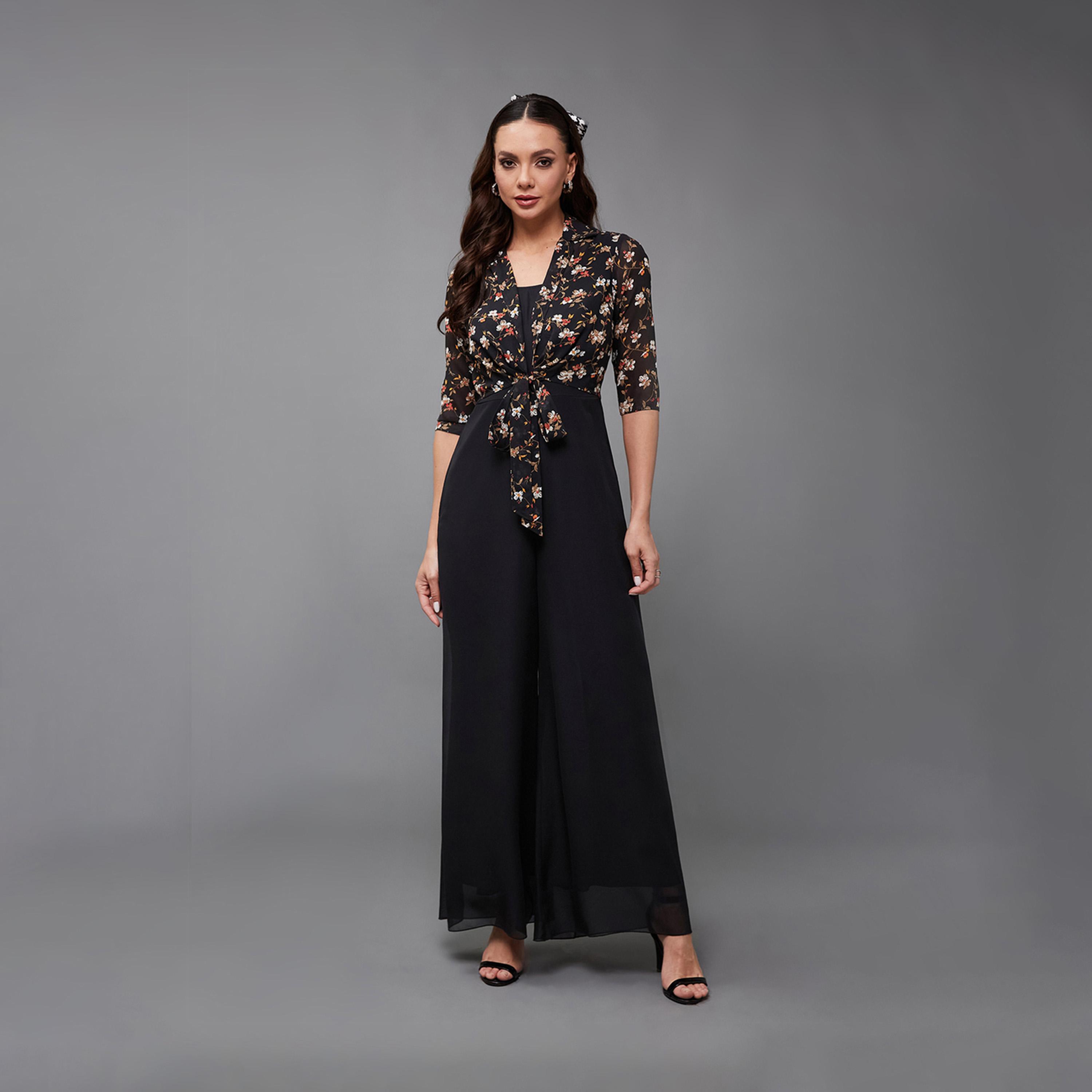 ستايلي - جمبسوت بطبعات الأزهار ورقبة دائرية وساقين واسعتين مع ربطة-women-clothing-jumpsuits-image-1