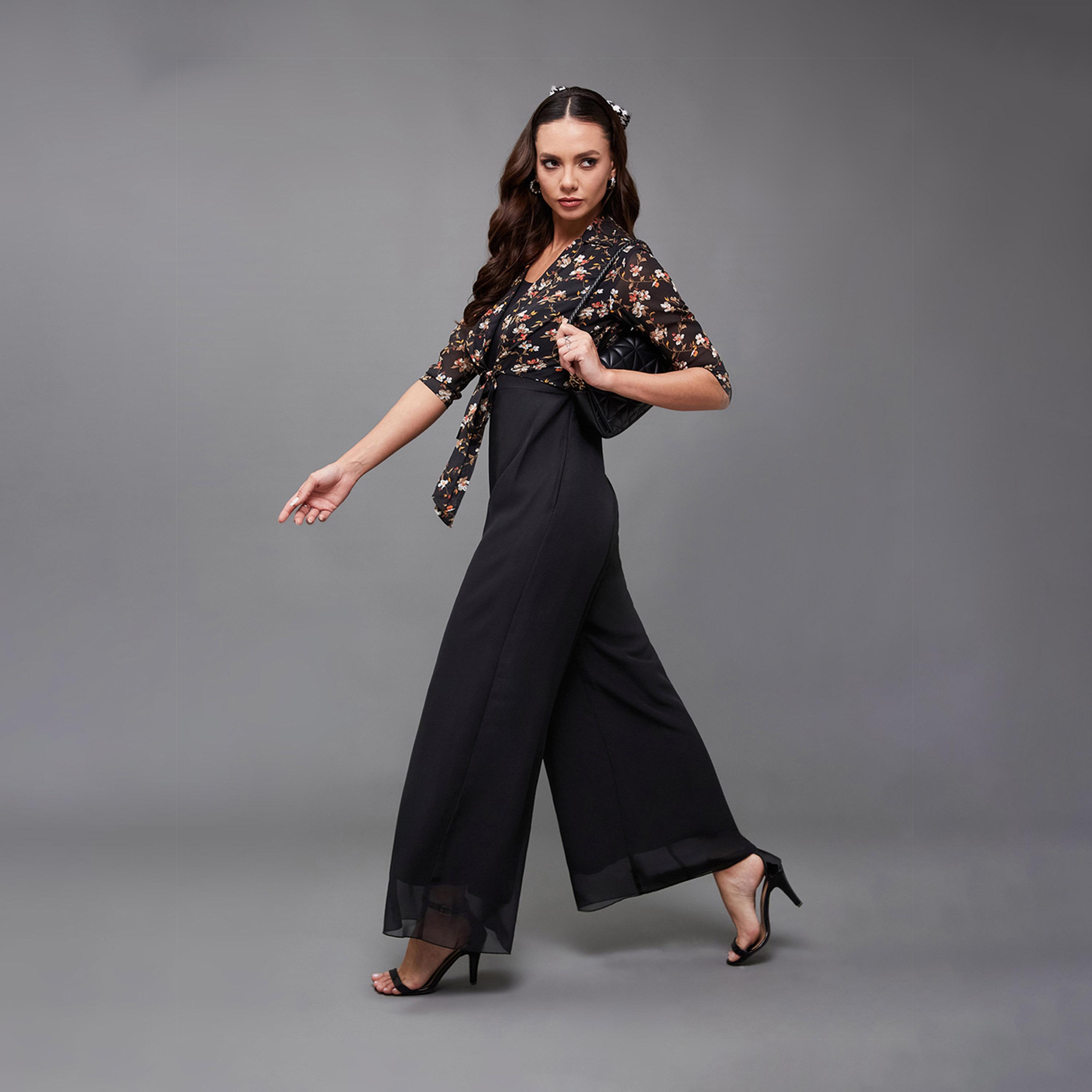 ستايلي - جمبسوت بطبعات الأزهار ورقبة دائرية وساقين واسعتين مع ربطة-women-clothing-jumpsuits-image-2
