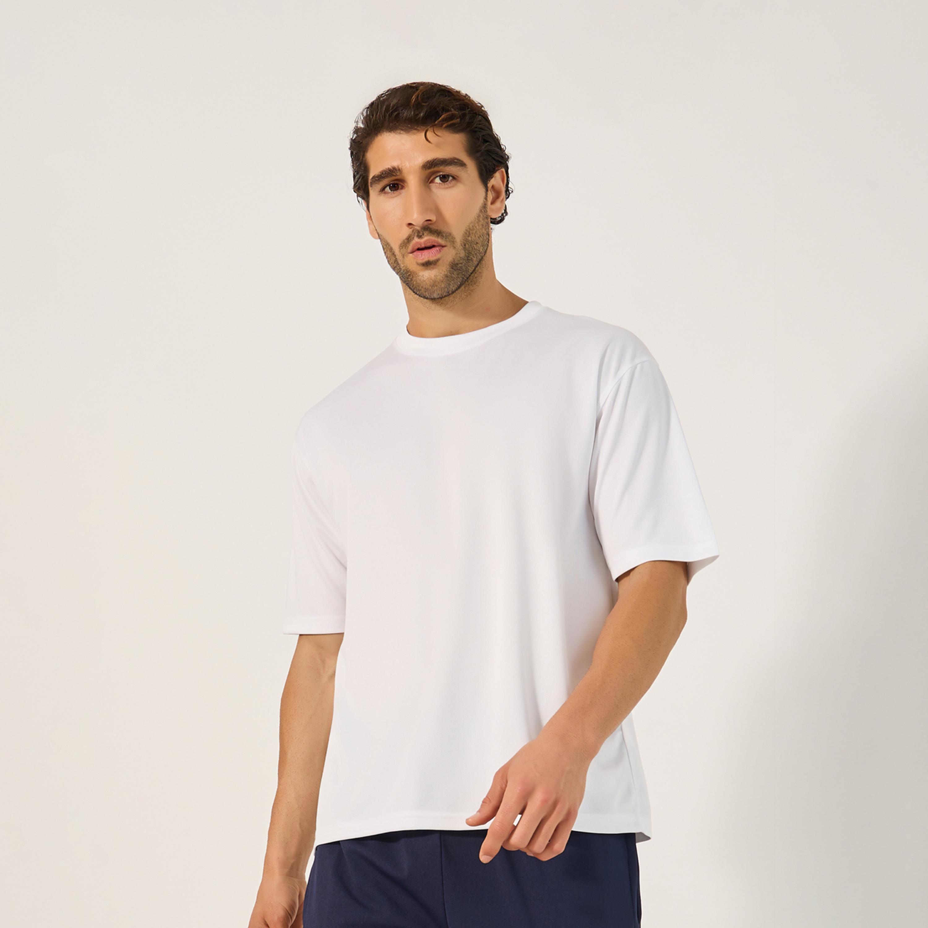 ستايلي - تي شيرت رياضي كبير الحجم برقبة دائرية وطبعة شعار-men-clothing-sportswearandactivewear-tshirtsandpolos-image-3