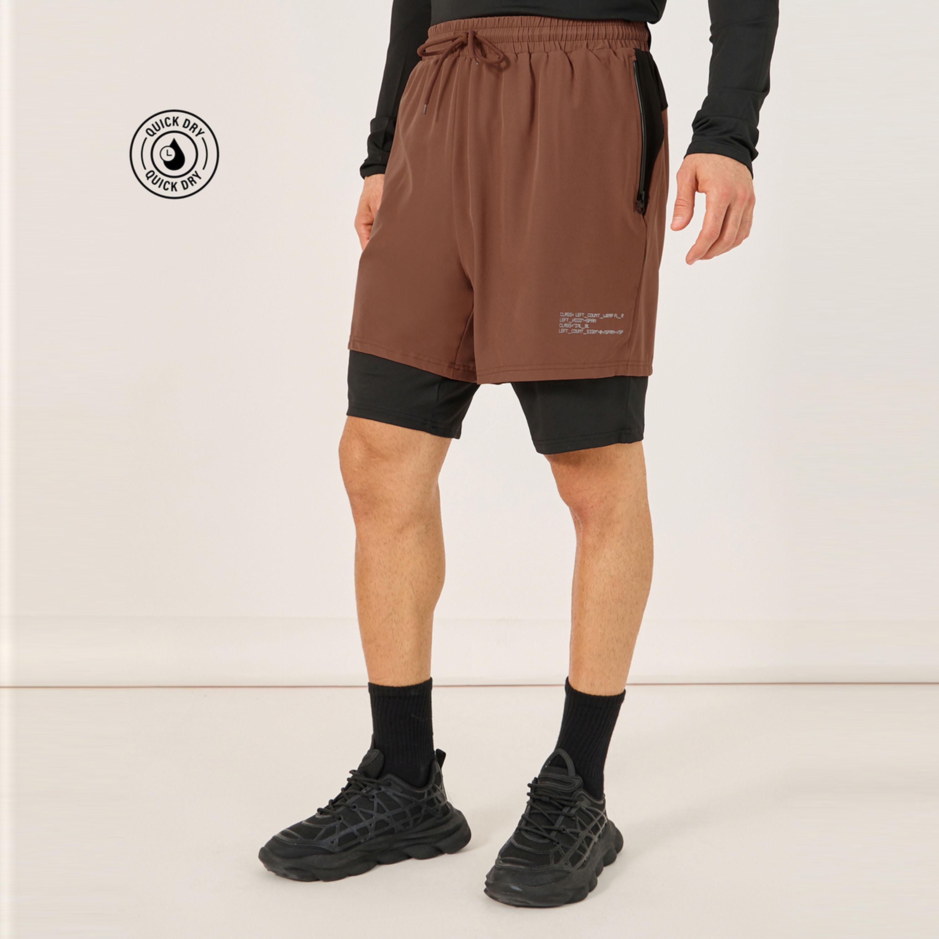 ستايلي - شورت الجري 2 في 1 ليميتد بطبعة بسيطة وجيب بسحاب-sports-men-clothing-bottoms-shorts-image-1