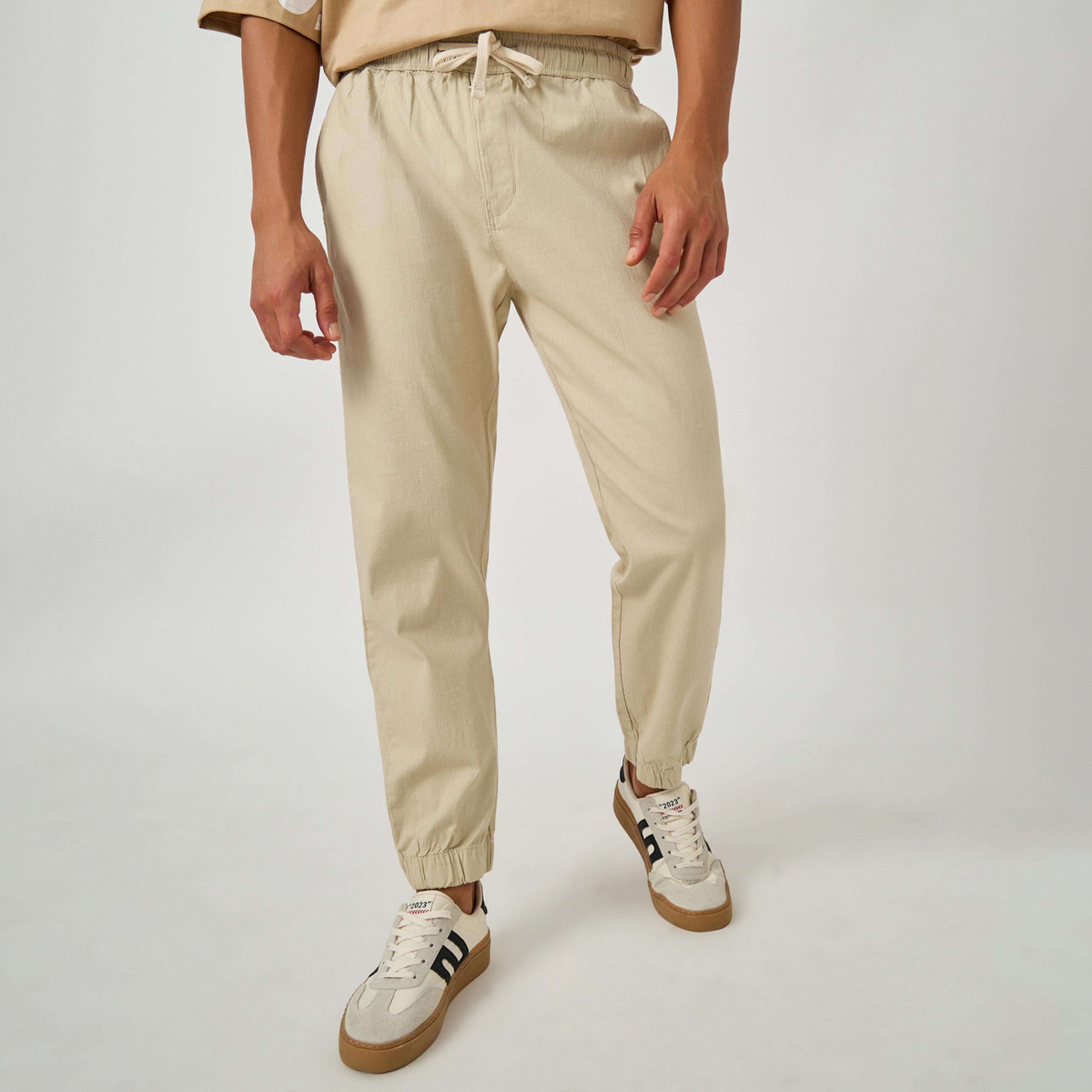 Styli Solid Relaxed Fit Elasticated Cuffed Joggers with Drawstring-men-clothing-bottoms-joggers-image-1