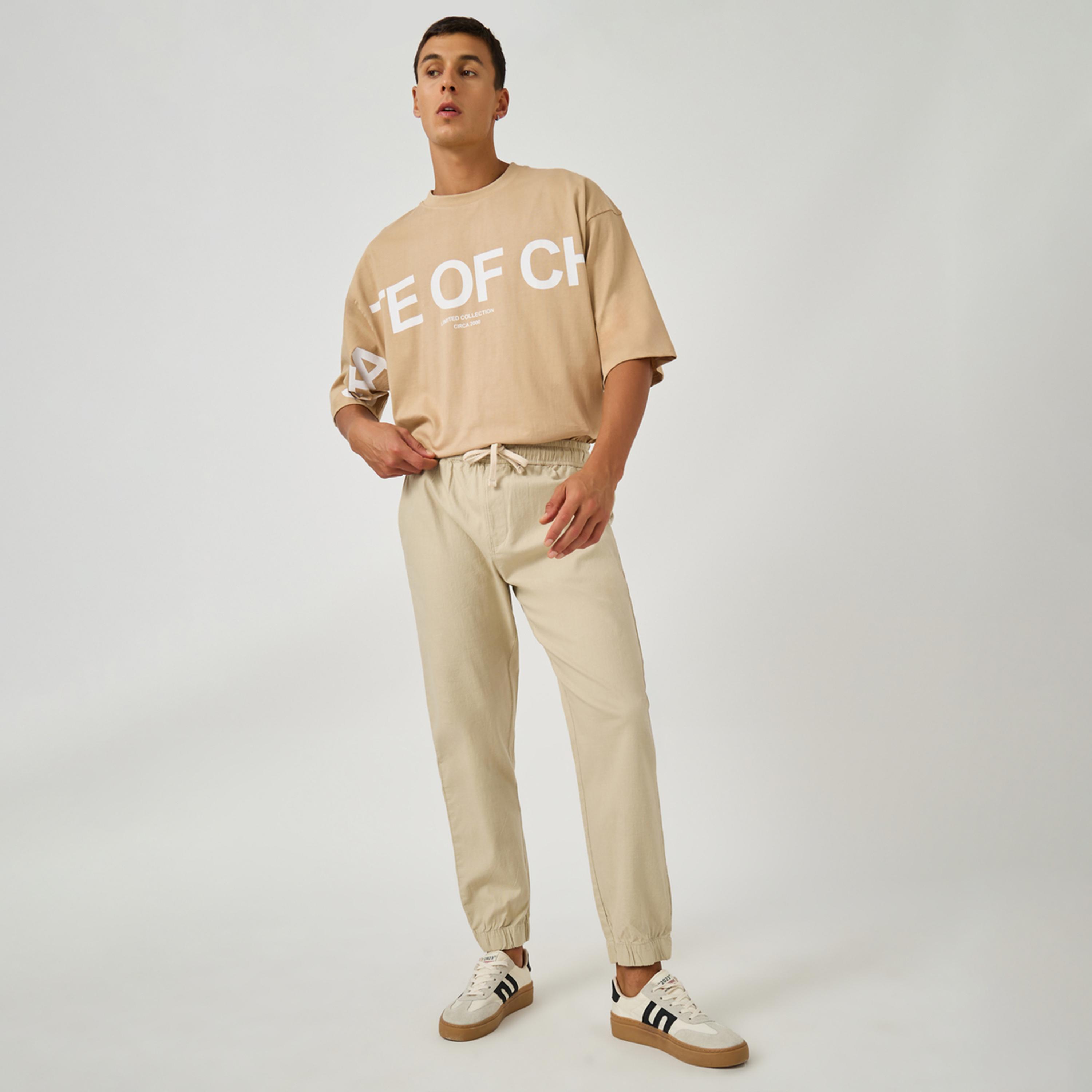 Styli Solid Relaxed Fit Elasticated Cuffed Joggers with Drawstring-men-clothing-bottoms-joggers-image-2