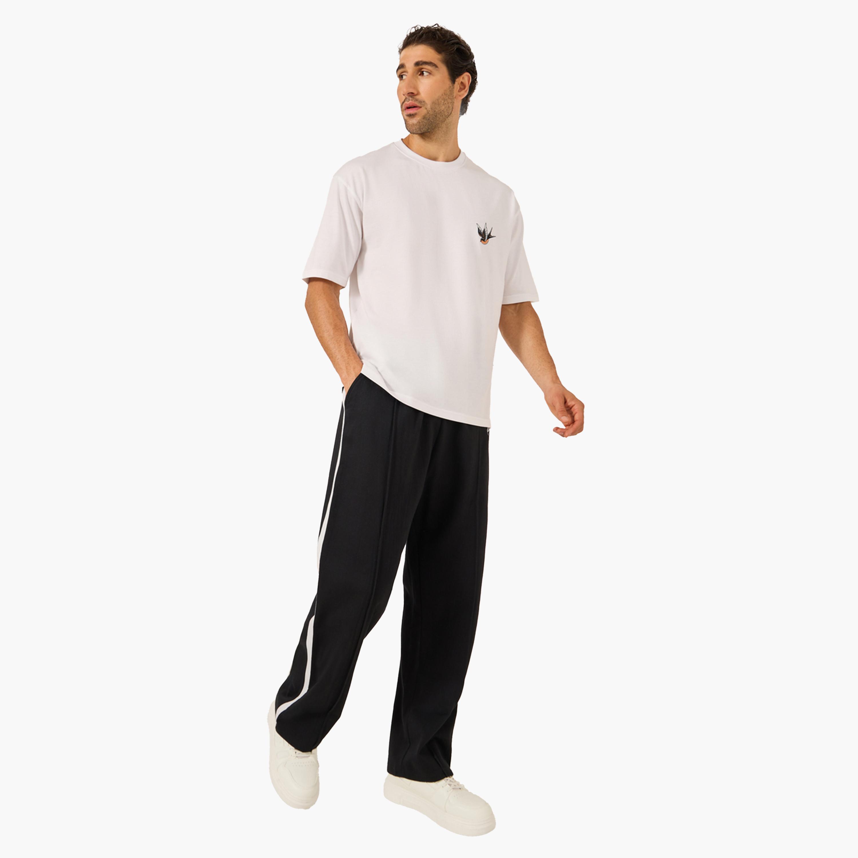Styli Oversized Wide Tuck Fleece Joggers with Side Stripe and Print Detail-men-clothing-bottoms-joggers-image-2