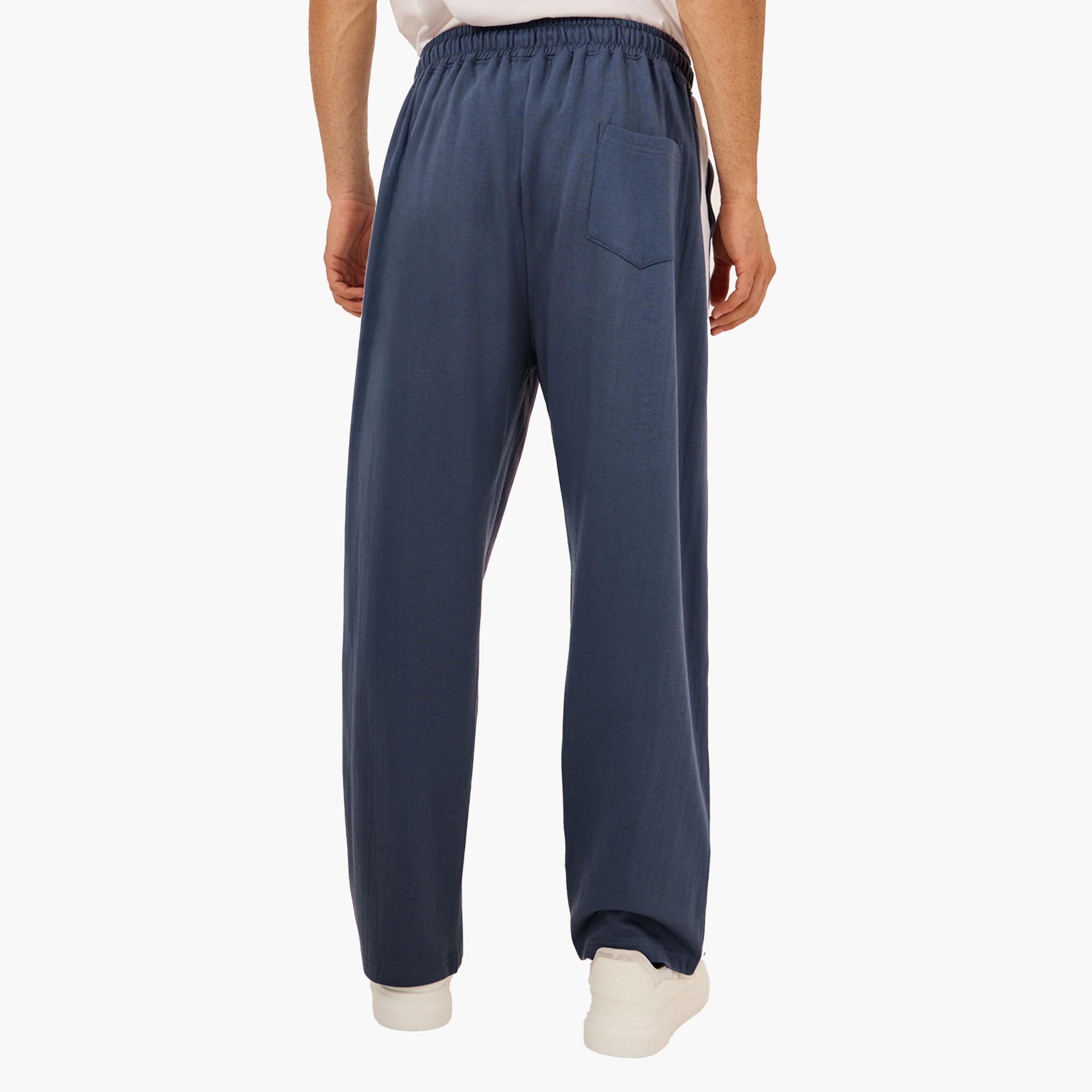 Styli Oversized Wide Tuck Fleece Joggers with Side Stripe and Print Detail-men-clothing-bottoms-joggers-image-4