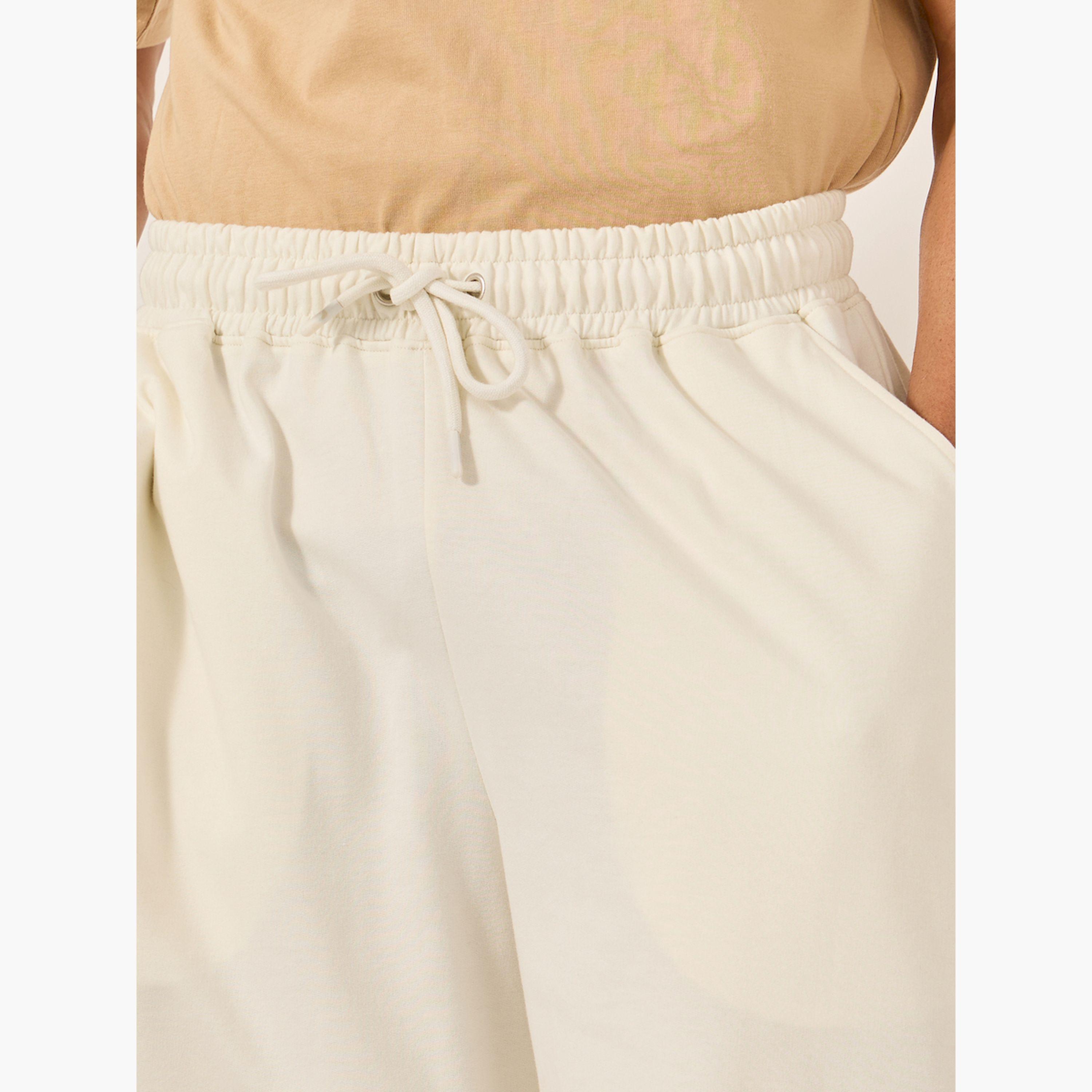 Styli Solid Raw Edge Hem Terry Oversized Shorts-men-clothing-bottoms-shorts-image-3