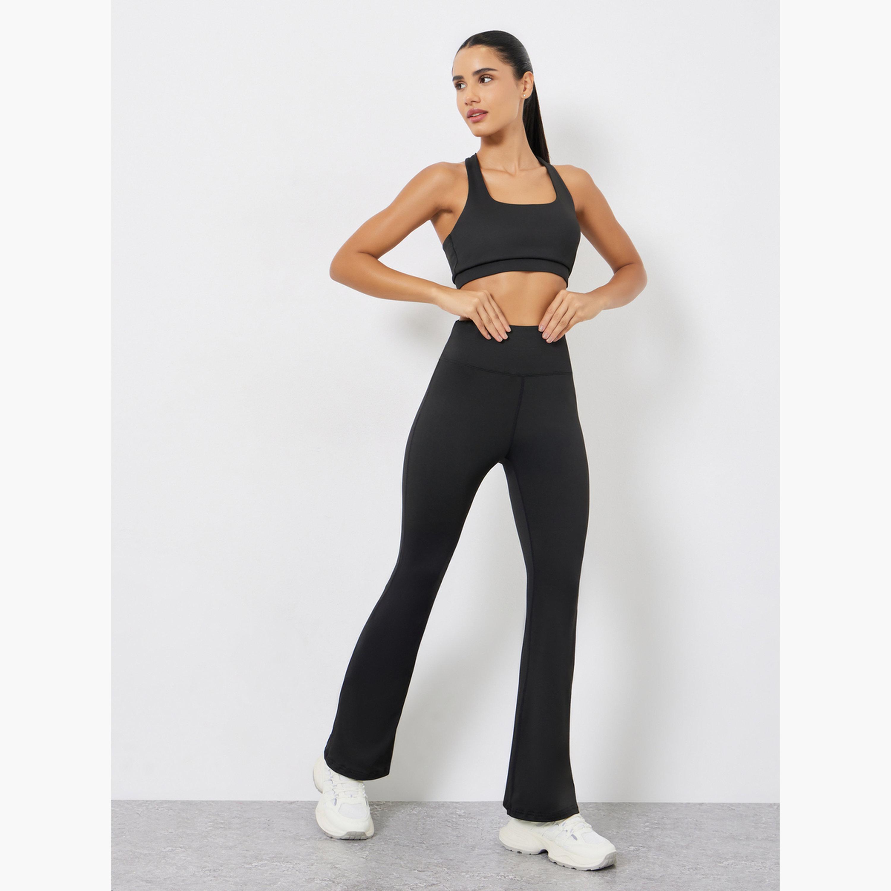 Styli Pack of 3 - Multi Cross Back Padded Sports Bra, Paneled Top and Flared Leggings-women-clothing-sportswearandactivewear-trackpantsandtracksuits-image-4