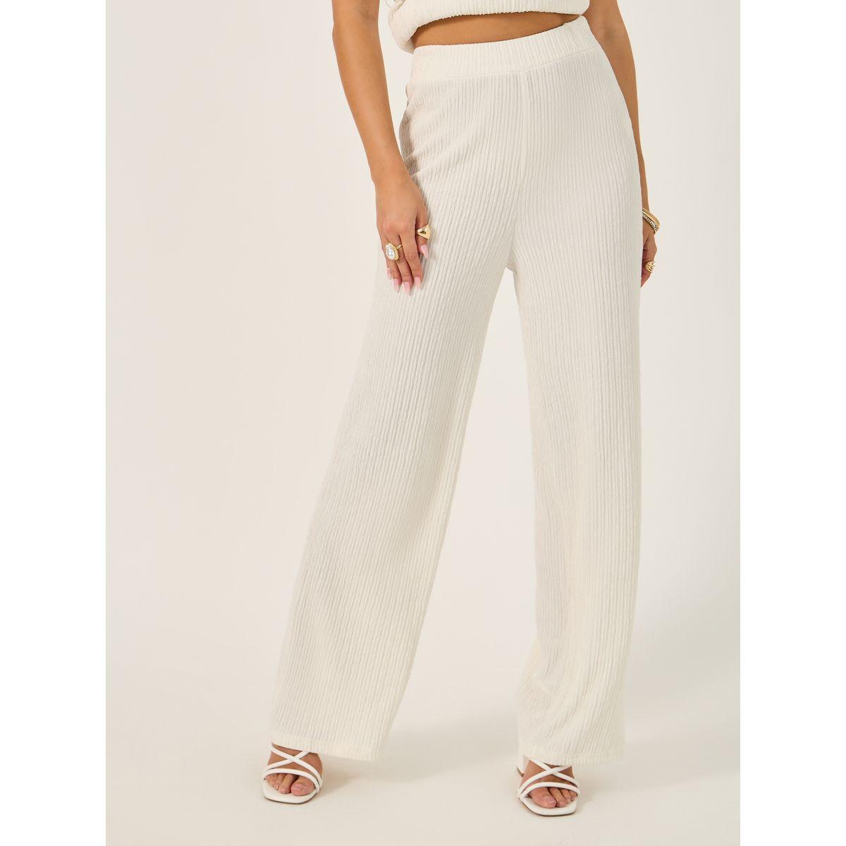 طقم منسق من بنطال بأرجل مستقيمة وبلوزة بلا أكمام-women-clothing-coordsets-image-5