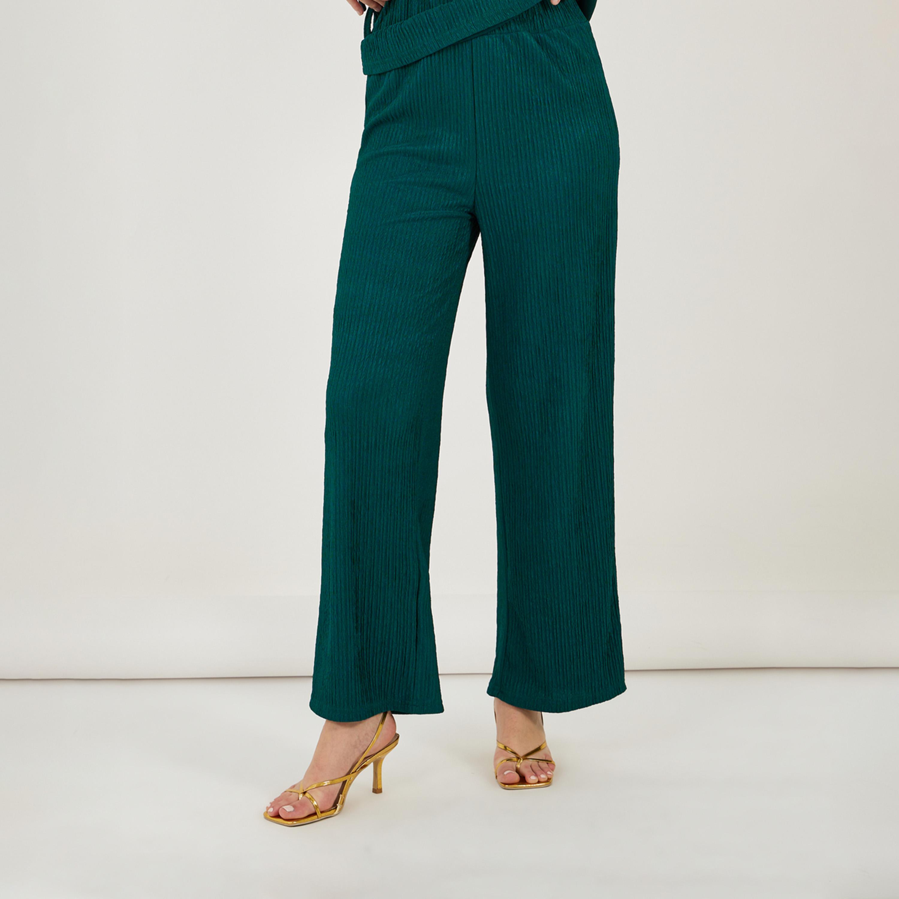 ستايلي - طقم بلوزة محبوكة بدون أكمام مع بنطال بقصة مستقيمة-women-clothing-coordsets-image-4