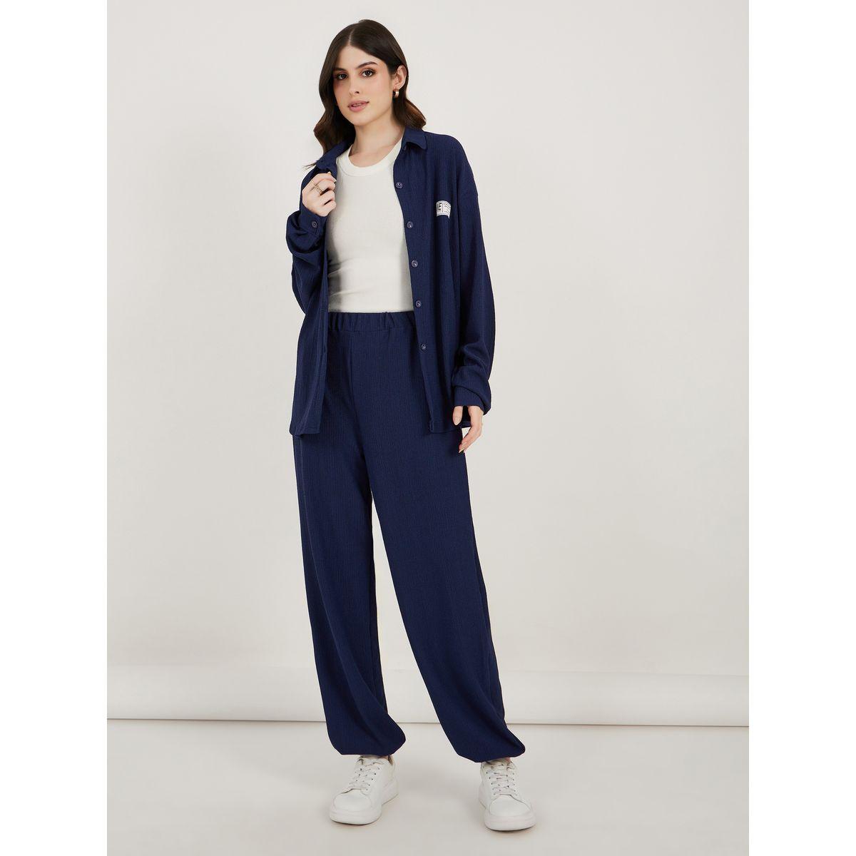 طقم منسق من جوغر بقصة مريحة وبلوزة-women-clothing-coordsets-image-1