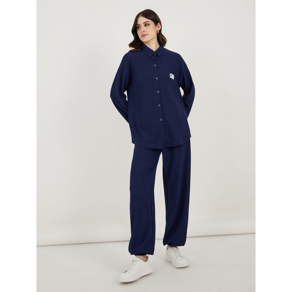 طقم منسق من جوغر بقصة مريحة وبلوزة-women-clothing-coordsets-image-2