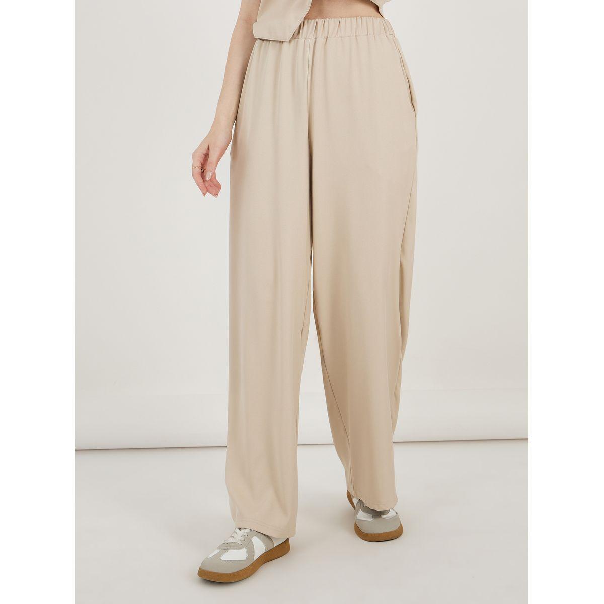 طقم منسق من بنطال بأرجل واسعة وجيليه بقصة عادية-women-clothing-coordsets-image-4