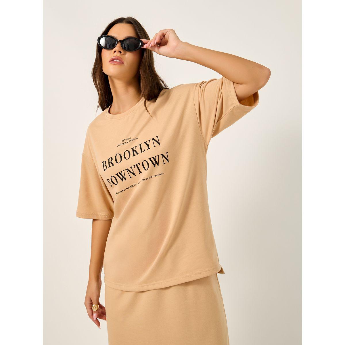 طقم تيشيرت واسع بطباعة ورسوم وتنورة ميدي-women-clothing-coordsets-image-2