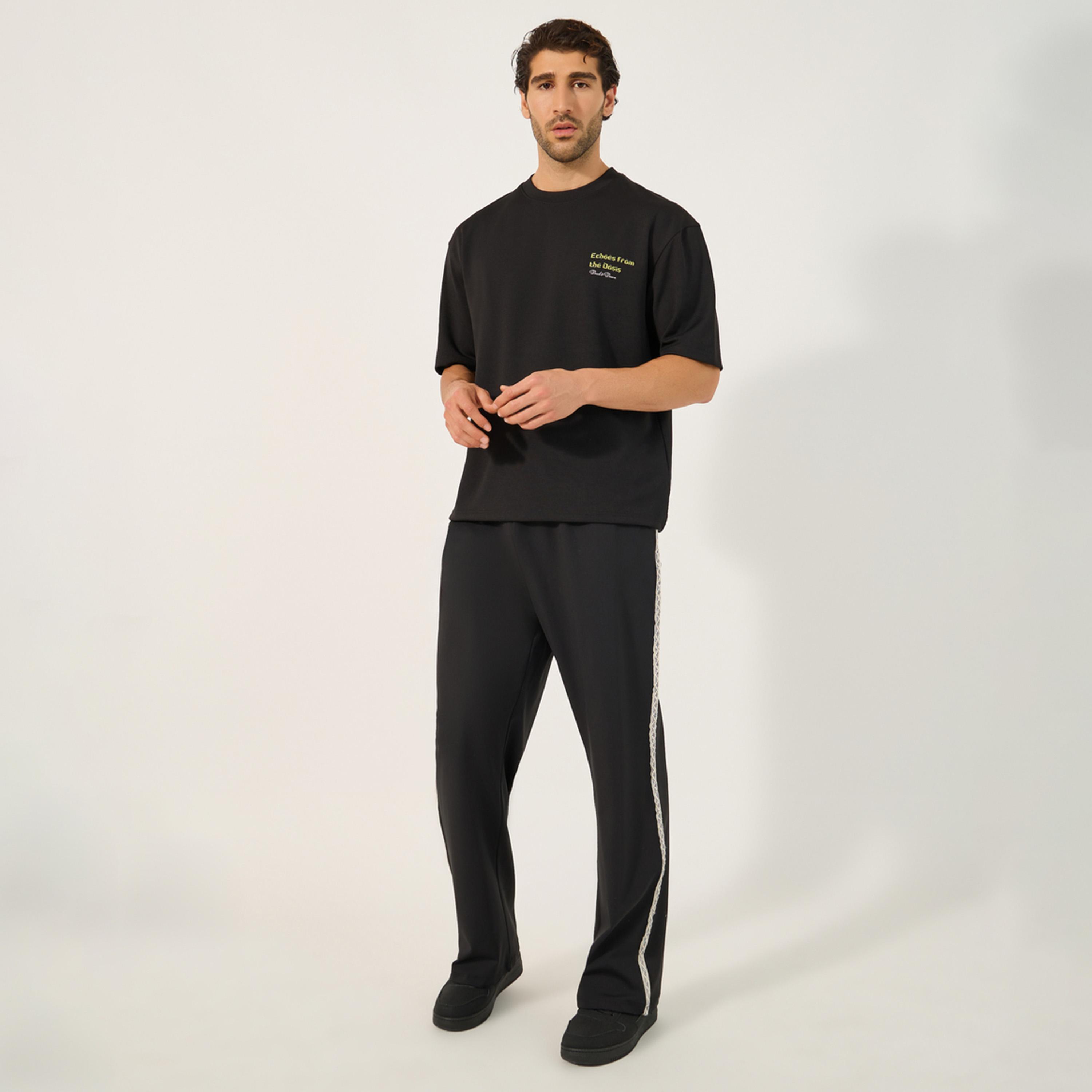 Styli Oversized Mid Rise Drawstring Joggers with Side Jacquard Tape-men-clothing-bottoms-joggers-image-2