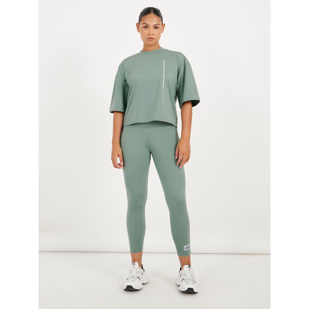 ليقنز بطول 7/8 وخصر مزموم مزين بشارة-women-clothing-sportswearandactivewear-bottoms-joggersandtrackpants-image-1