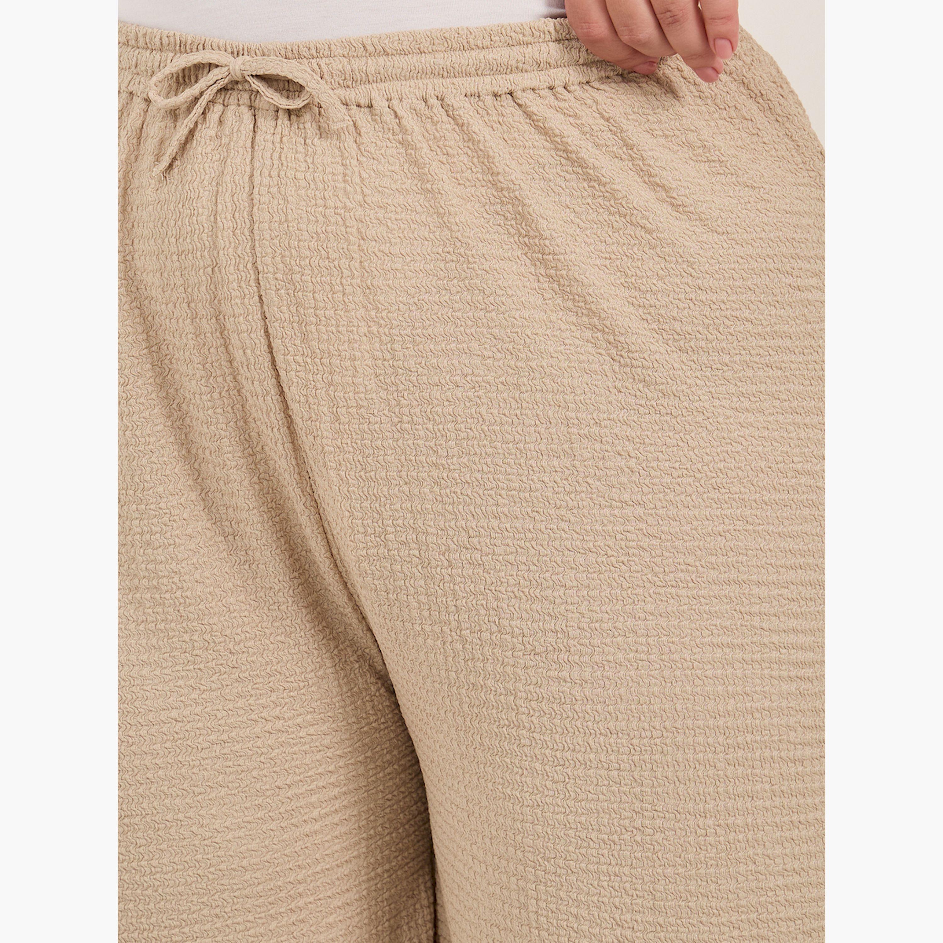 Styli Plus Size Textured Wide Leg Trousers with Drawstring-women-clothing-bottoms-trousers-image-4