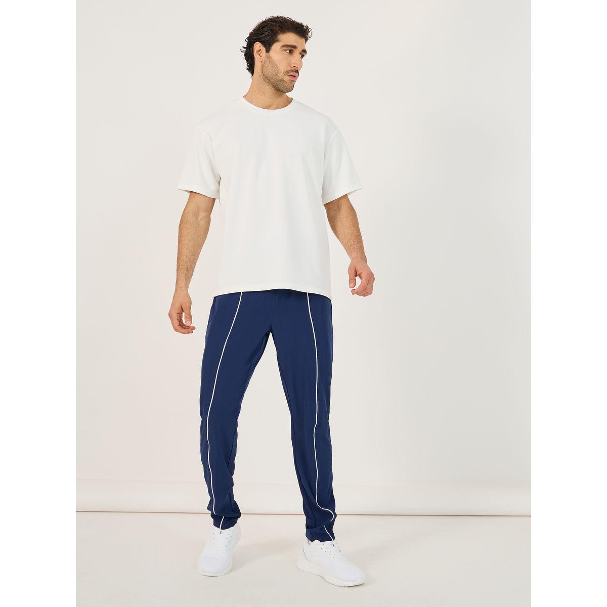 تيشيرت رياضي فضفاض بتفاصيل بارزة الملمس-men-clothing-sportswearandactivewear-tshirtsandpolos-image-2
