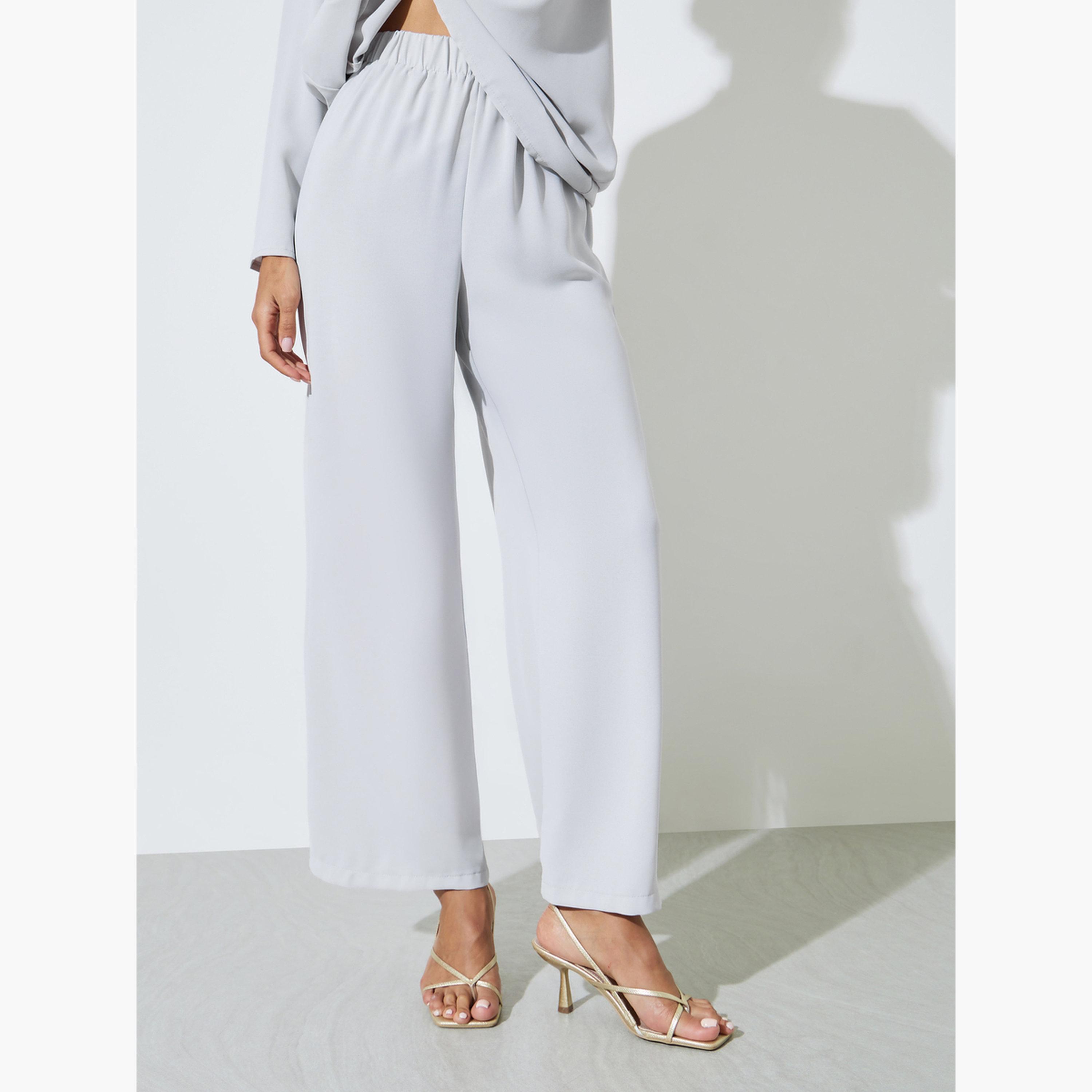 Amirah X Styli Solid High Neck Longline Top with Button Detail and Wide Leg Pants Set-women-arabicclothing-sets-image-5