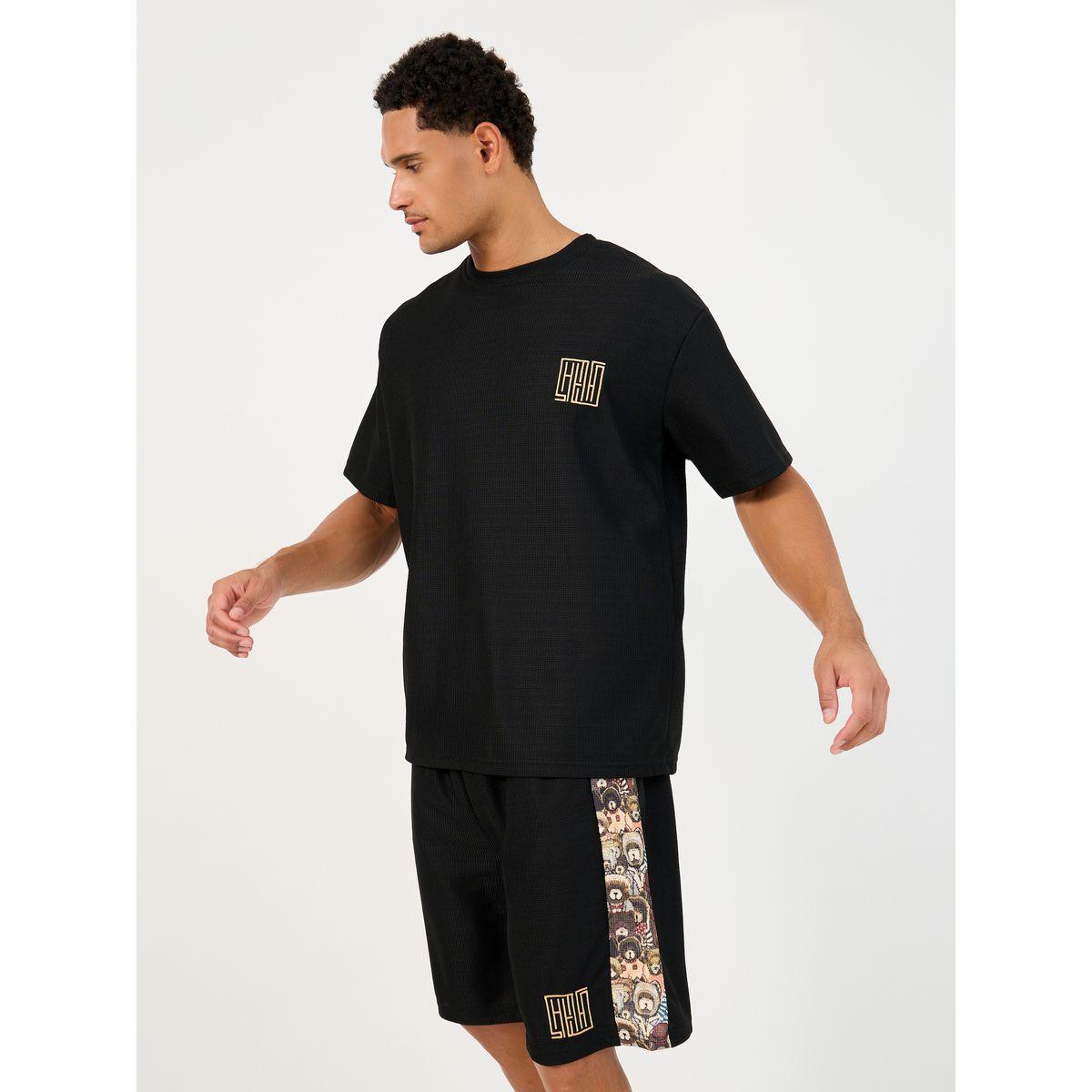 طقم منسق من شورت وتيشيرت فضفاض بطبعة جرافيك-men-clothing-coordsets-image-2