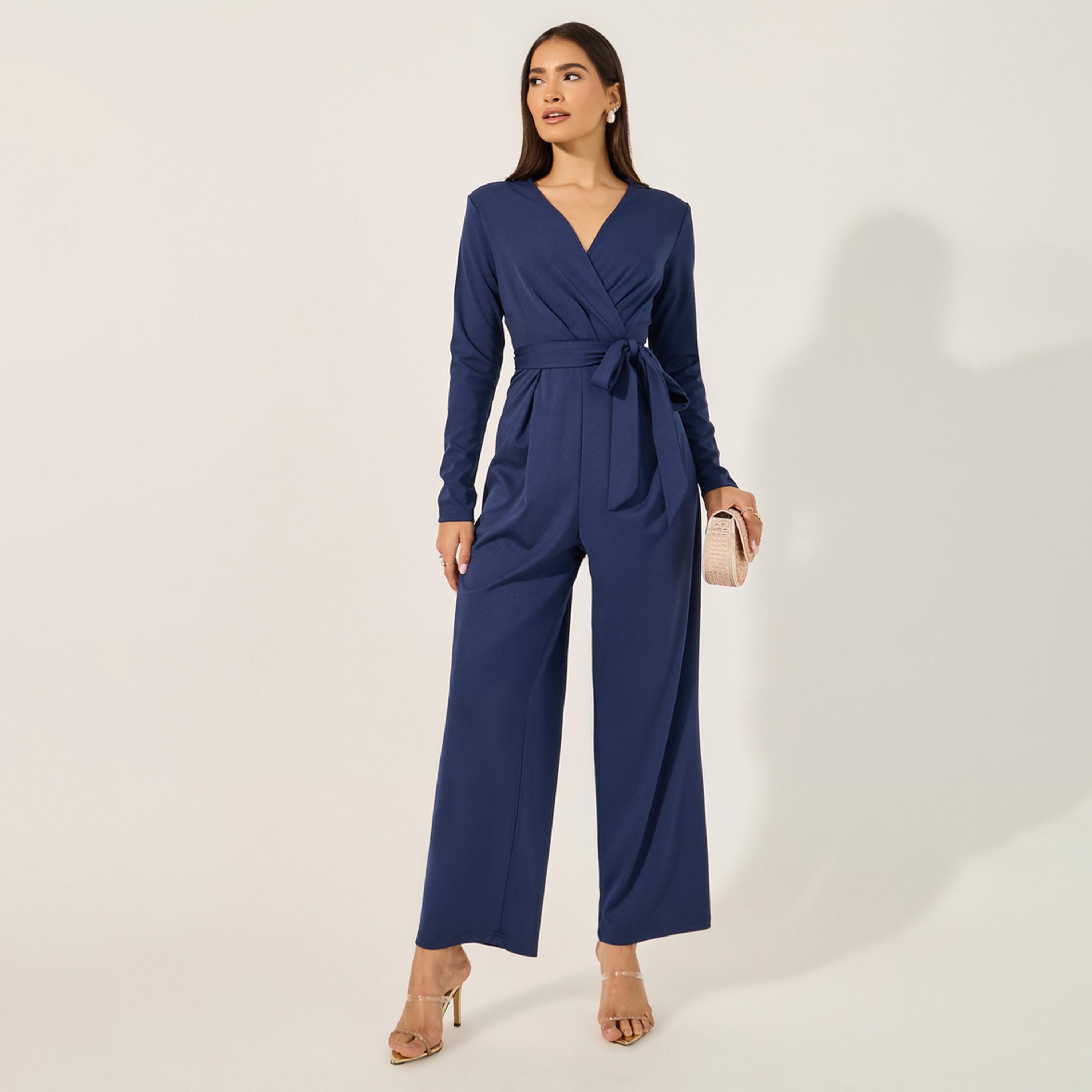 ستايلي - جمبسوت بأكمام طويلة ورقبة على شكل حرف V من قماش مطاطي مع حزام ربط عند الخصر-women-clothing-jumpsuits-image-1