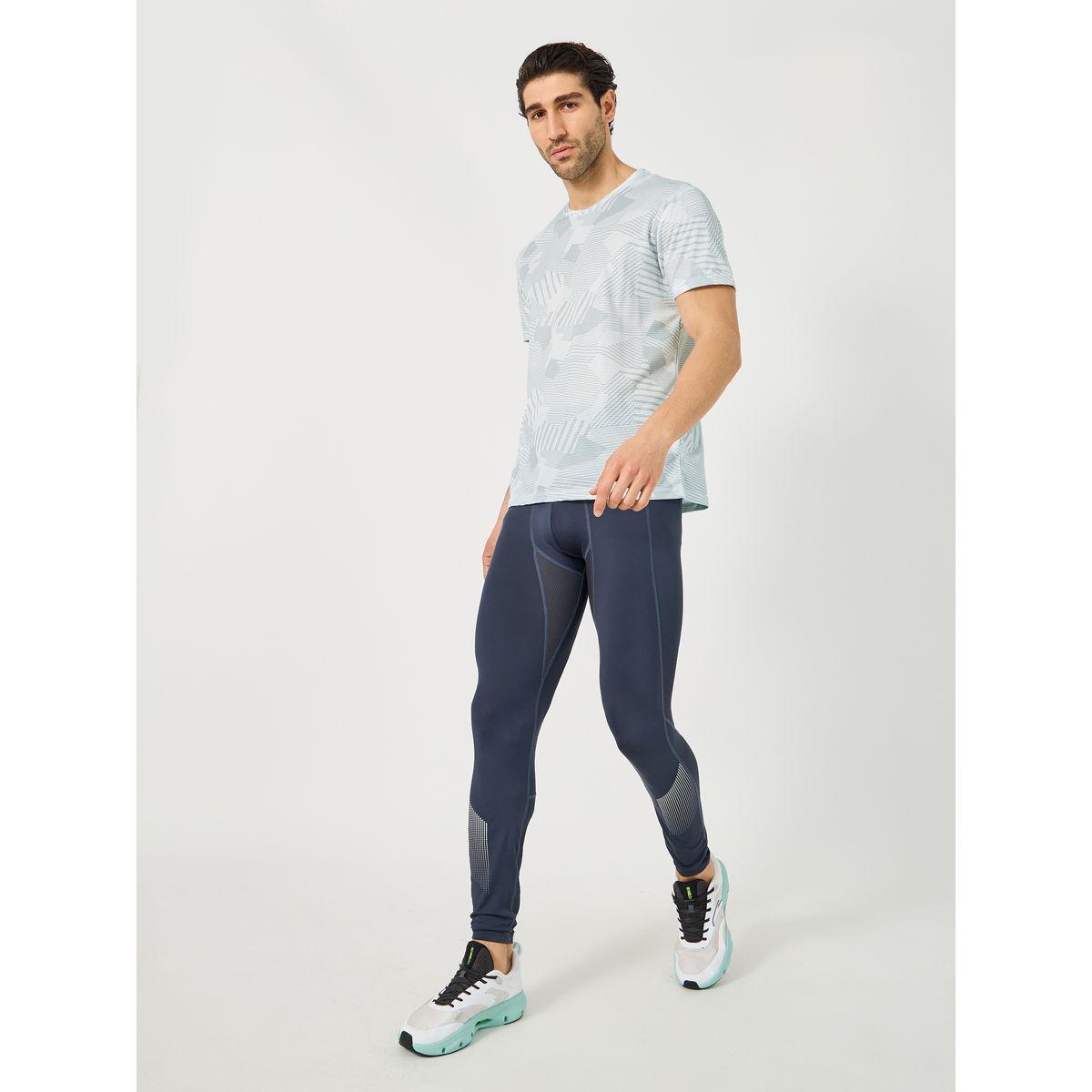 تيشيرت رياضي للتدريب مُطبع بالكامل-men-clothing-sportswearandactivewear-tshirtsandpolos-image-2