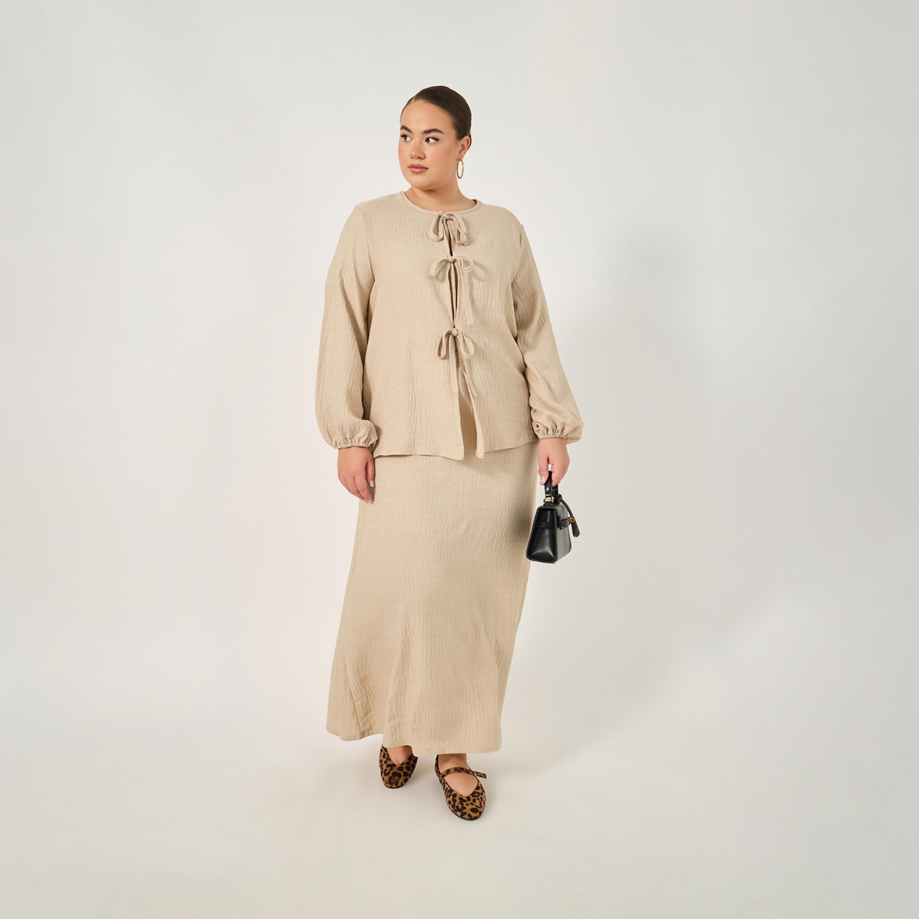 Styli Plus Size Textured Balloon Sleeve Blouse with Bow Tie-Up Detail-women-clothing-shirtsandblouses-blouses-image-2
