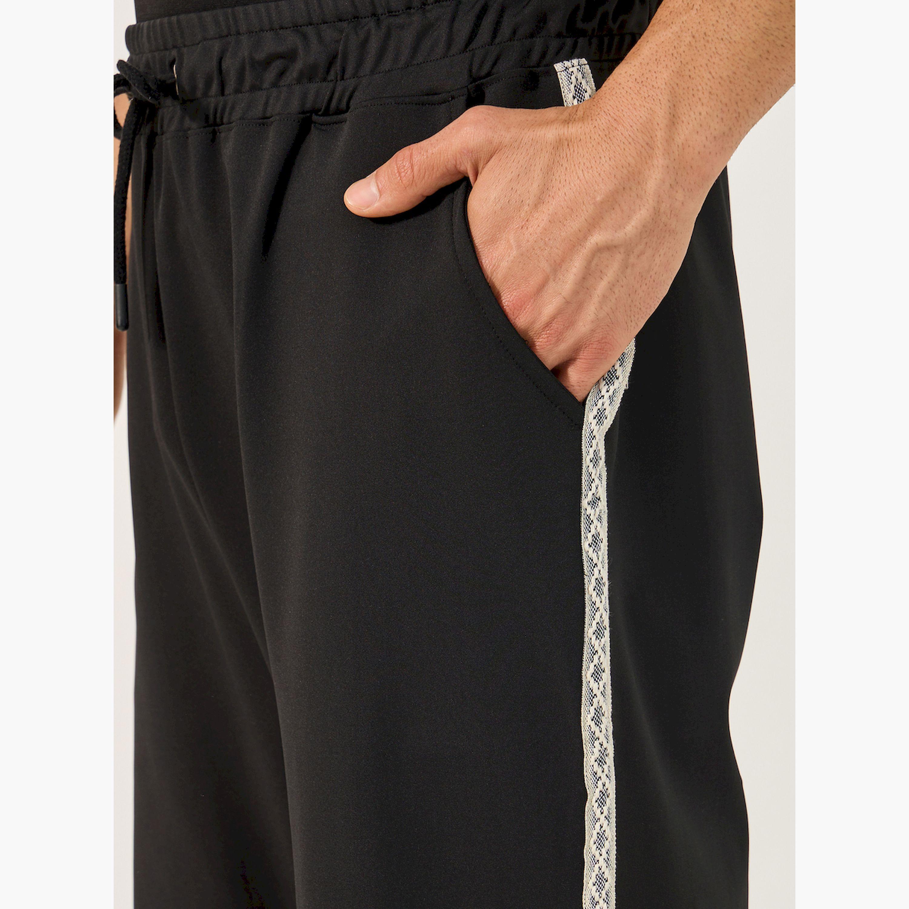 ستايلي - بنطال رياضي بقصة مريحة وخصر متوسط مع رباط-men-clothing-bottoms-joggers-image-3